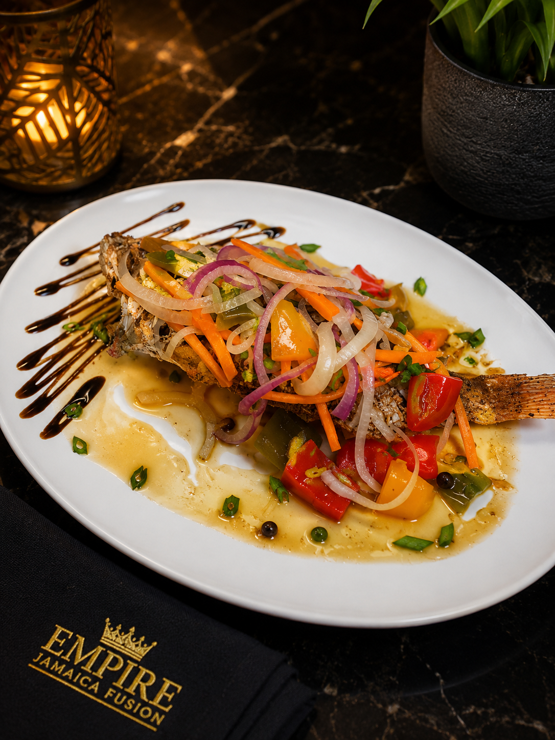 Signature Caribbean dish plated for a private dining course