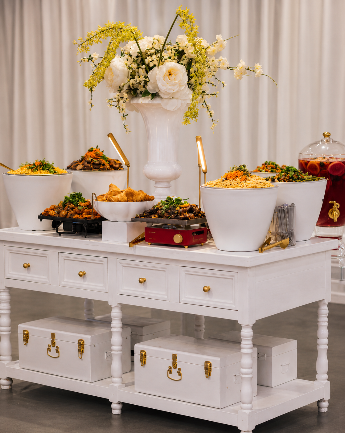 Elegant catering buffet with floral centerpiece for a private event