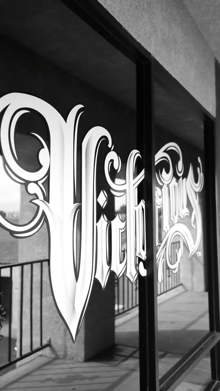 Barber giving a men's haircut at Victorious Barbershop Cathedral City