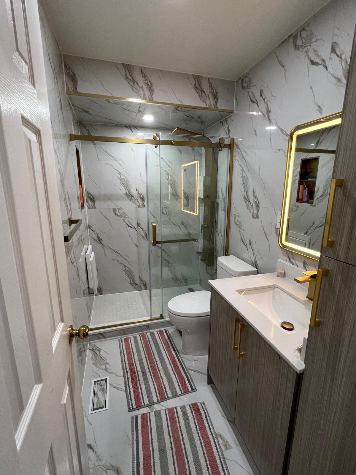 Luxury Bathroom with Marble & Gold Fixtures