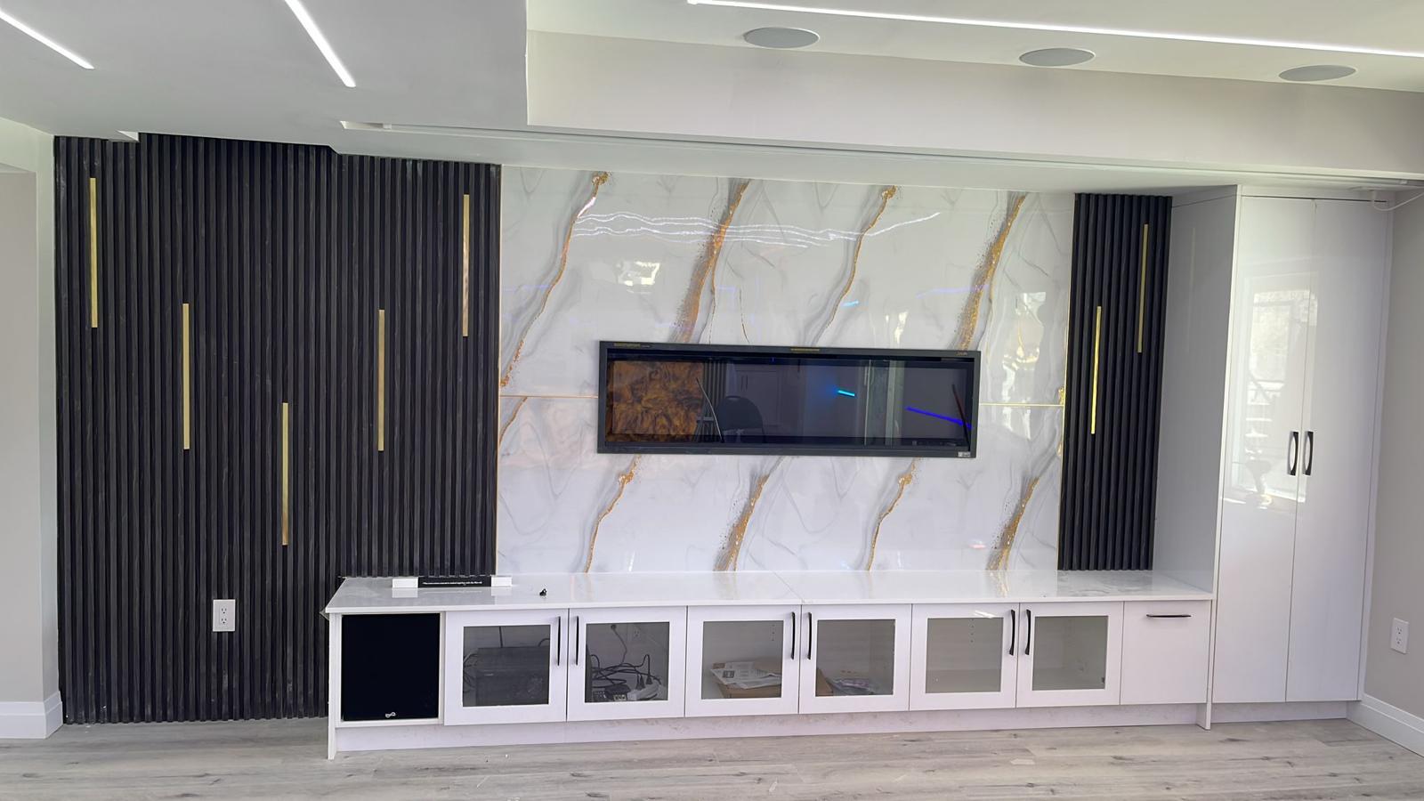 Custom TV Wall with Fireplace & Marble
