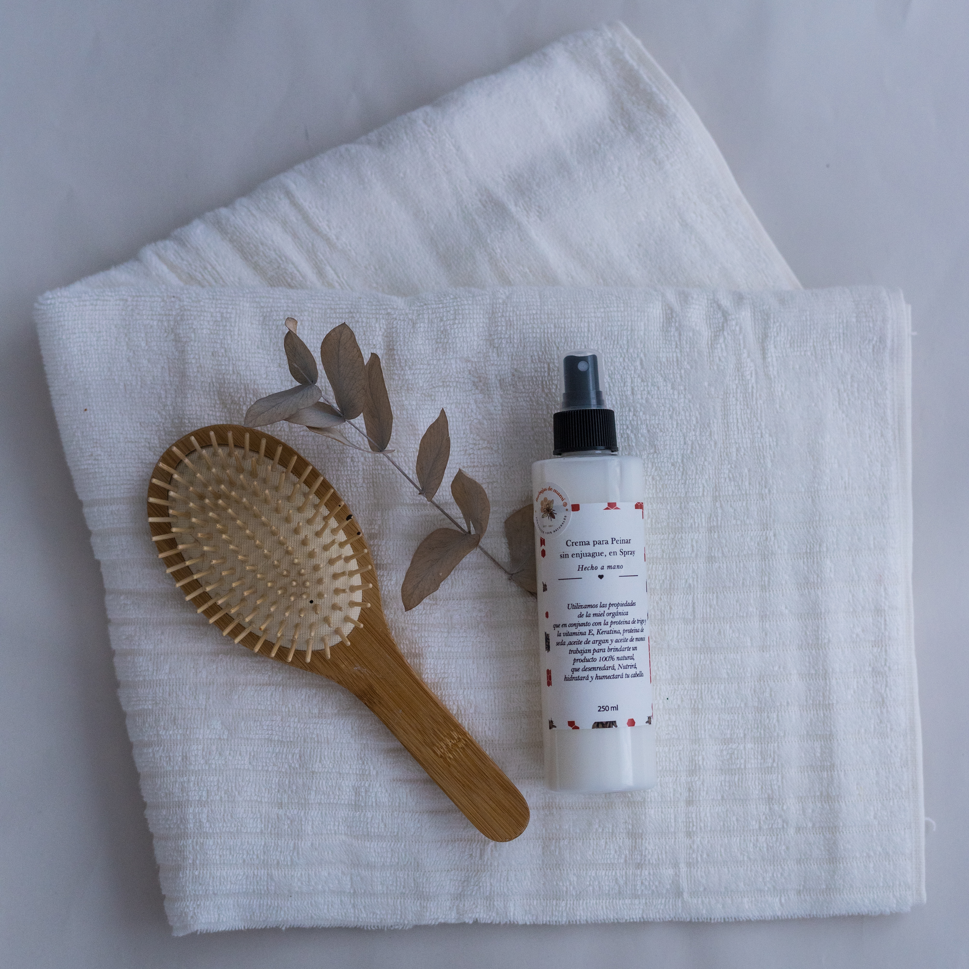 Crema para peinar sin enjuague en spray