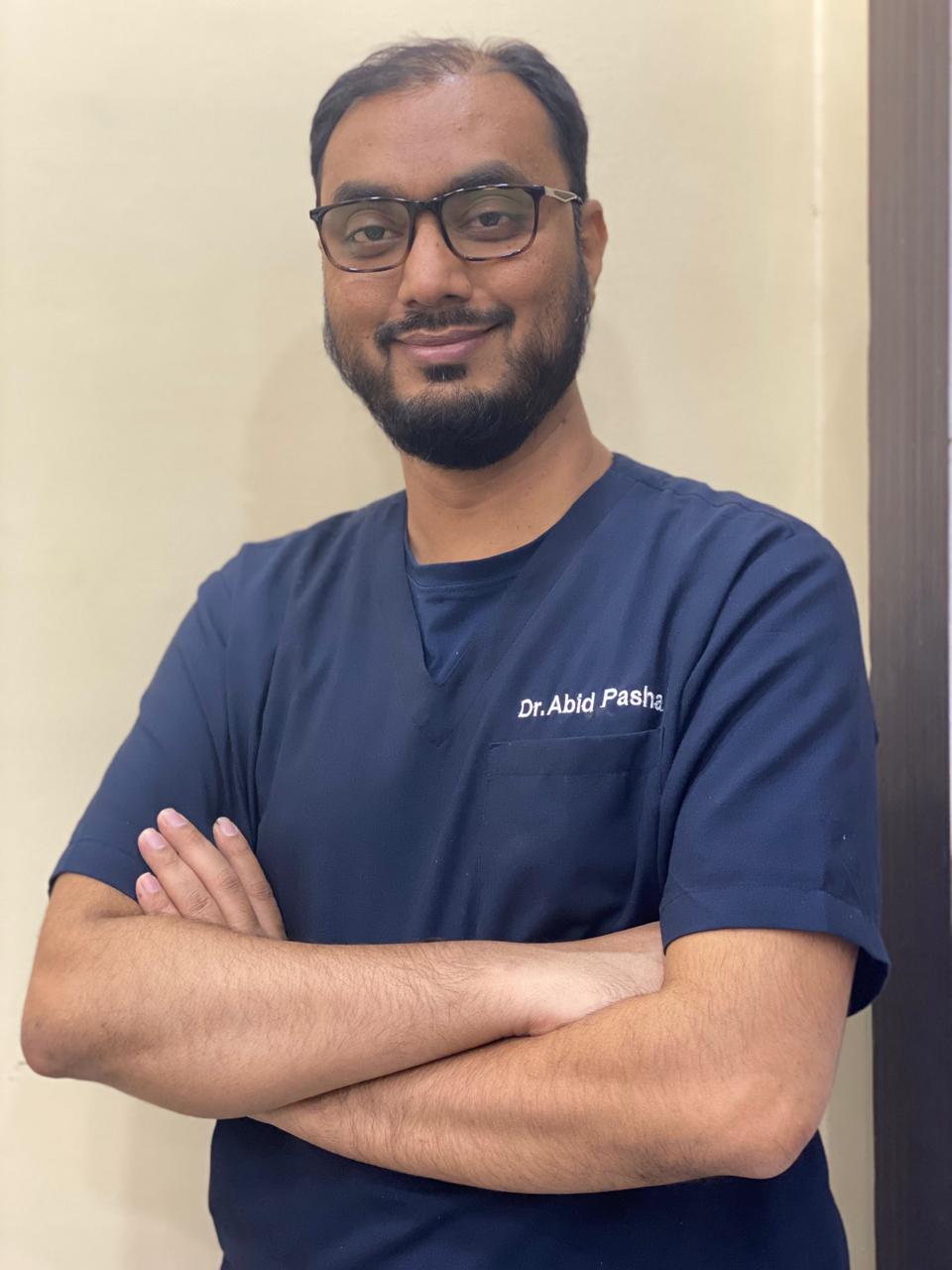 Dr. Abid Pasha