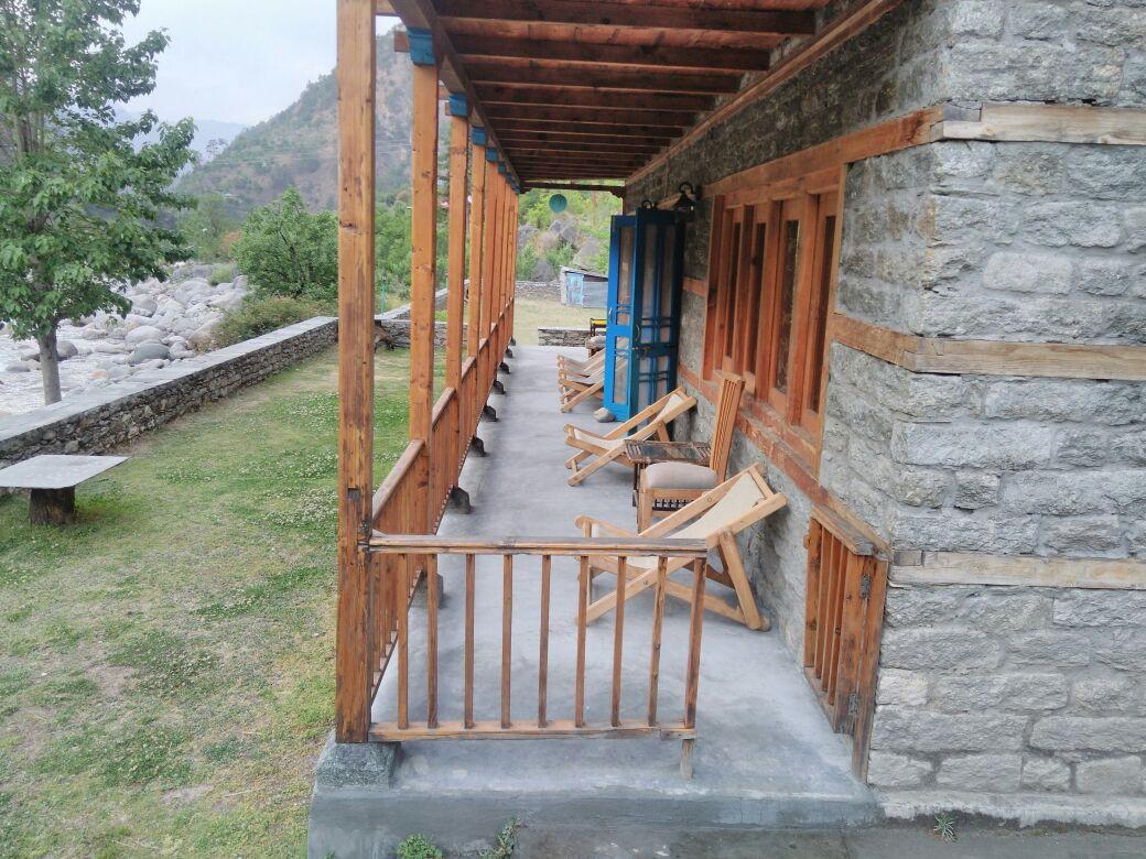 The veranda overlooks the river below