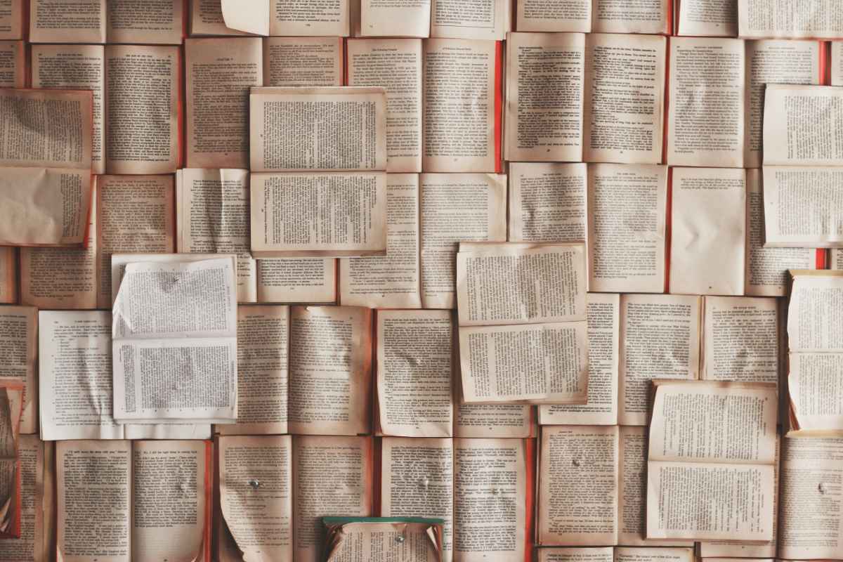 Wall of open book pages