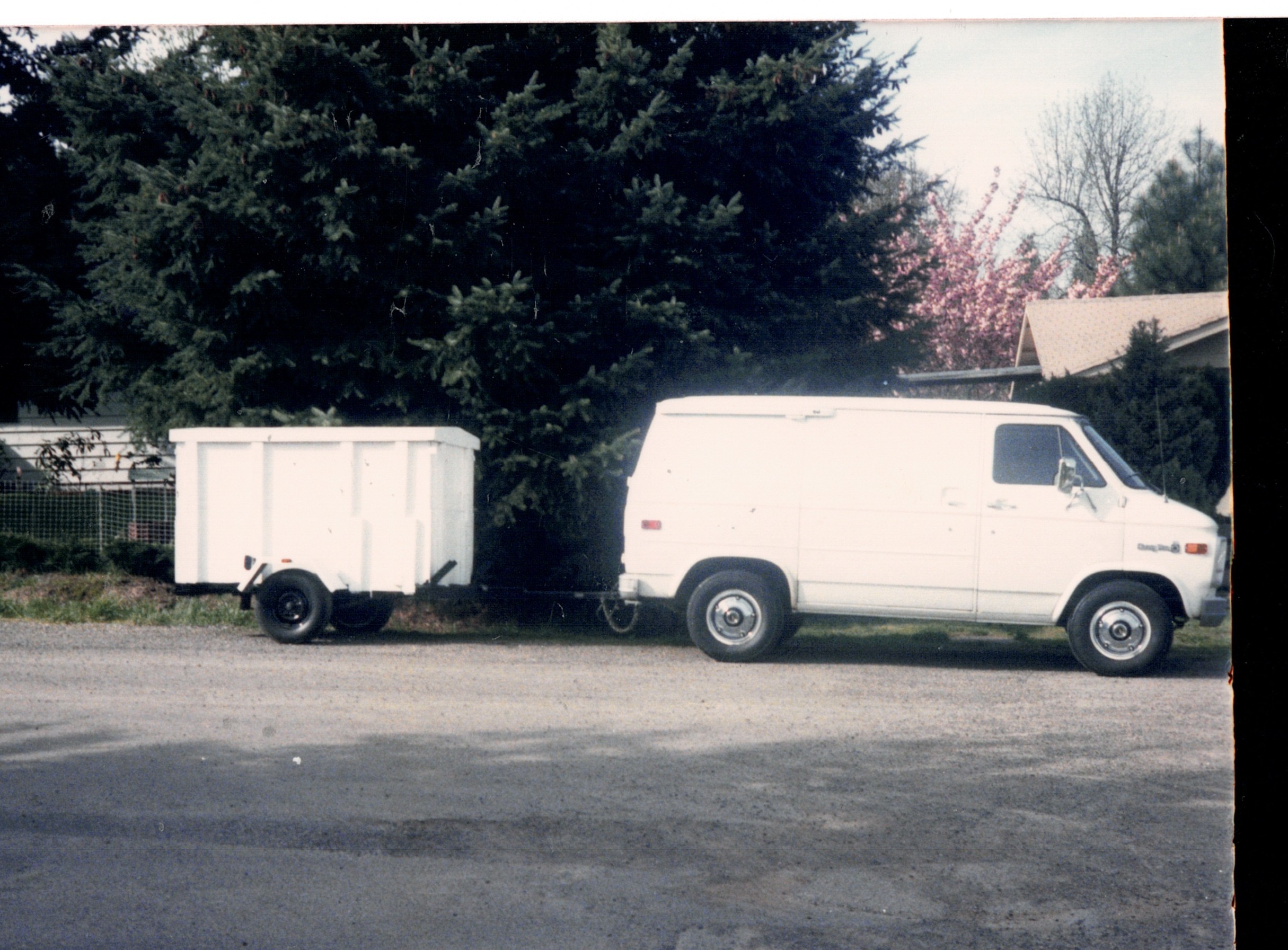 The janitorial company van and trailer