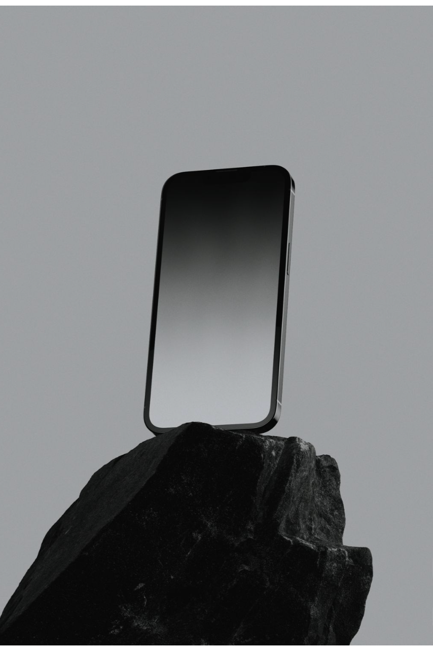 Credit Stone — phone resting on stone