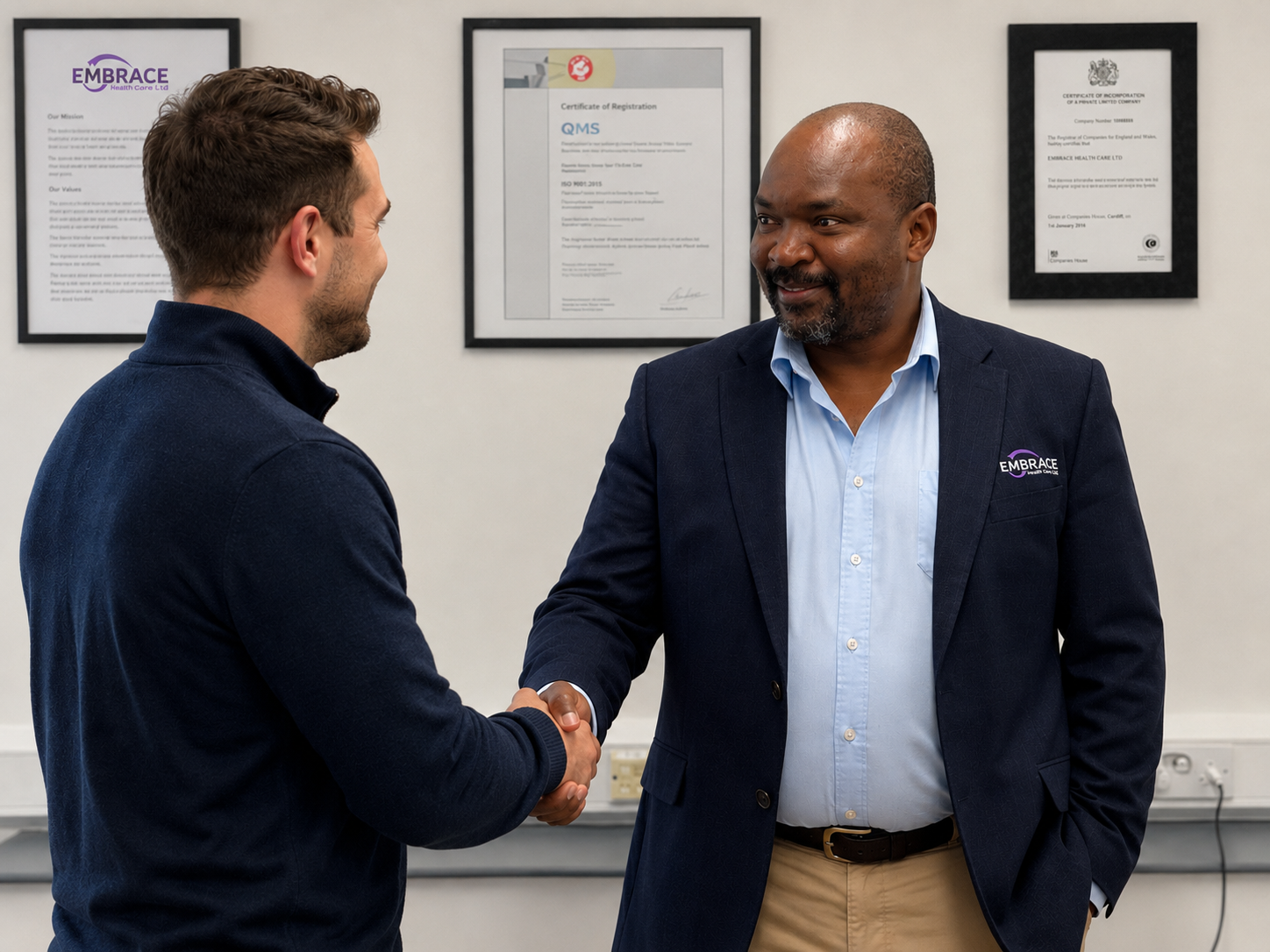 Embrace Healthcare manager welcoming a new team member with a handshake