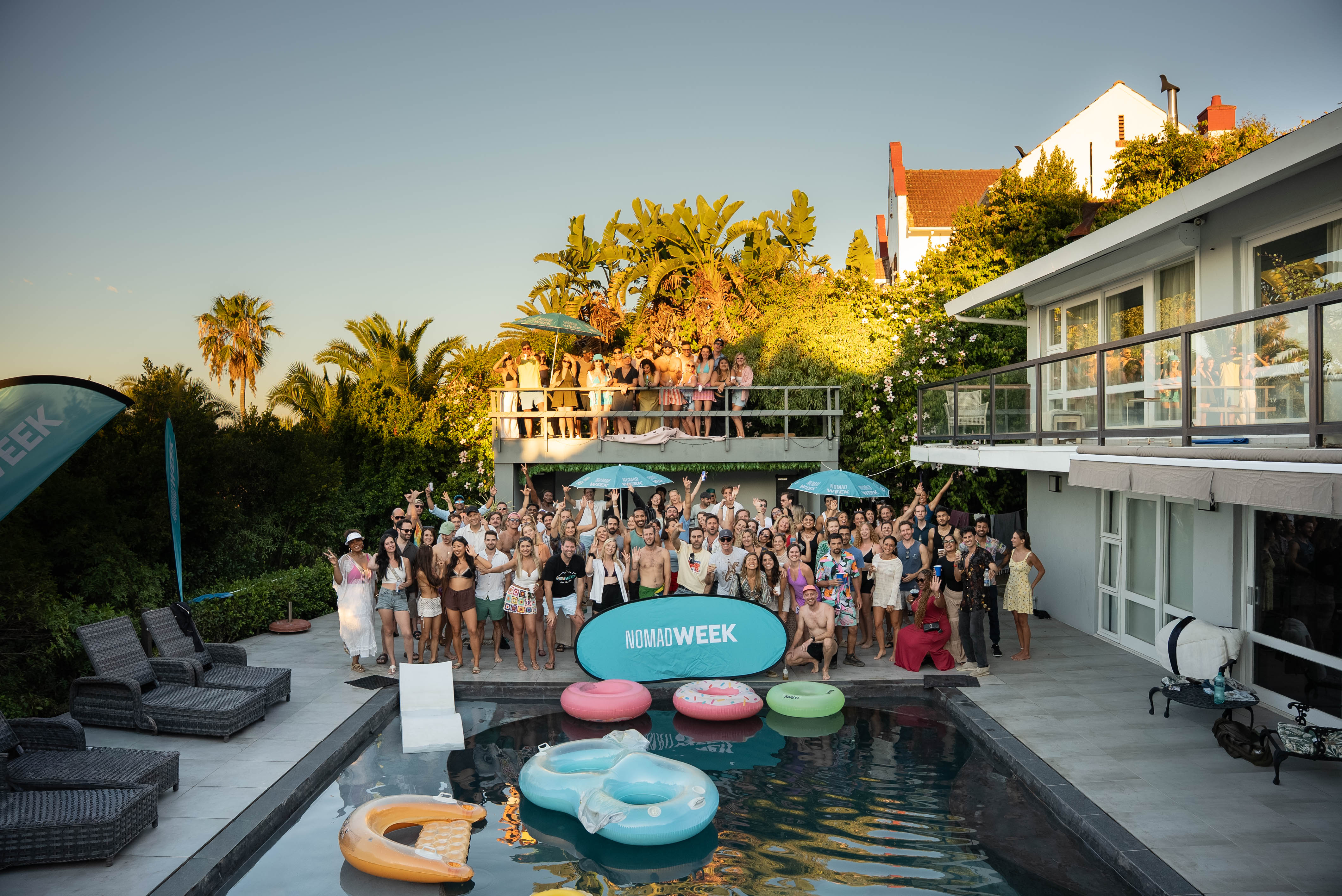 Nomad Week poolside group photo