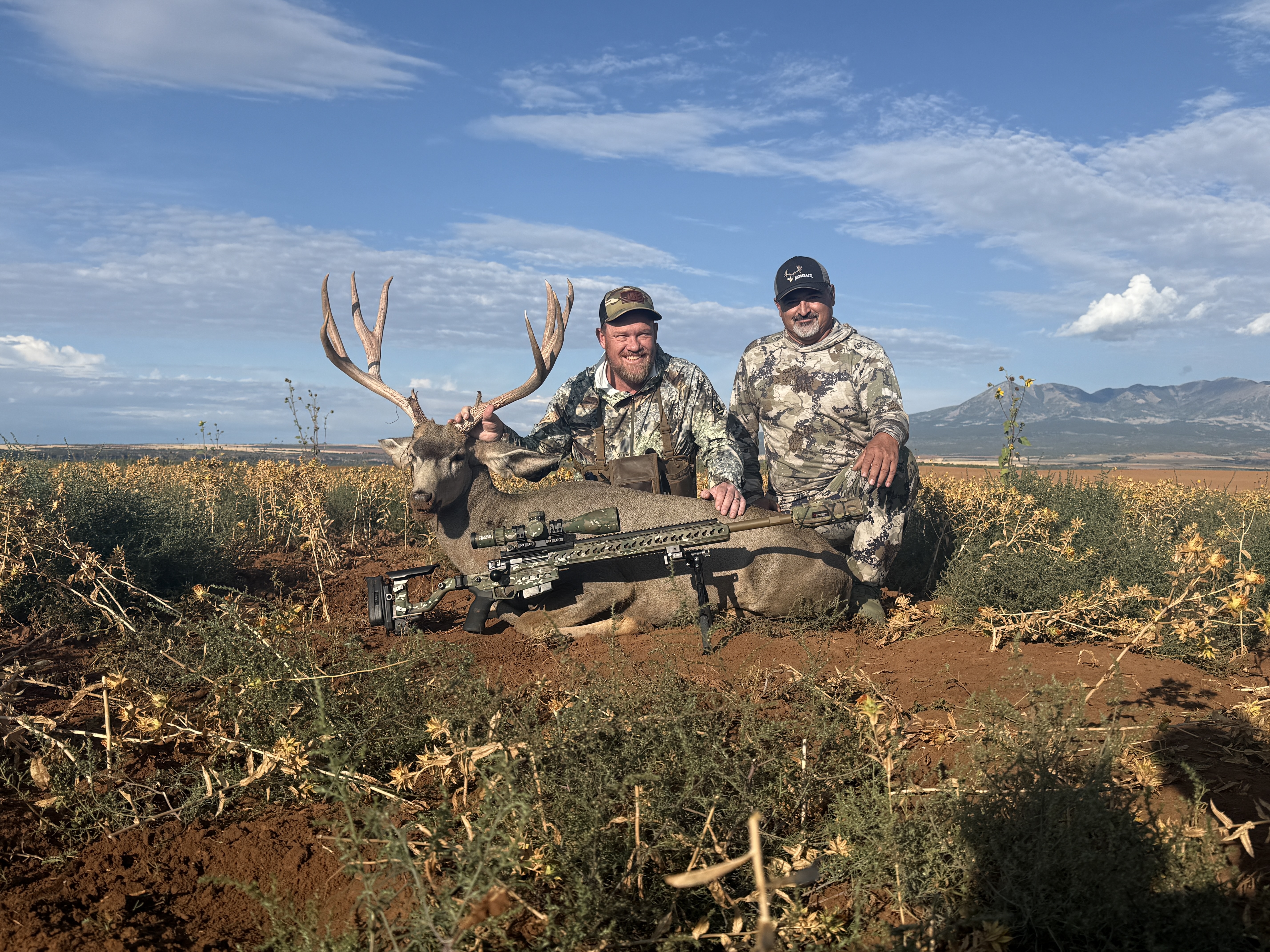 Hunter with Trophy Mule Deer