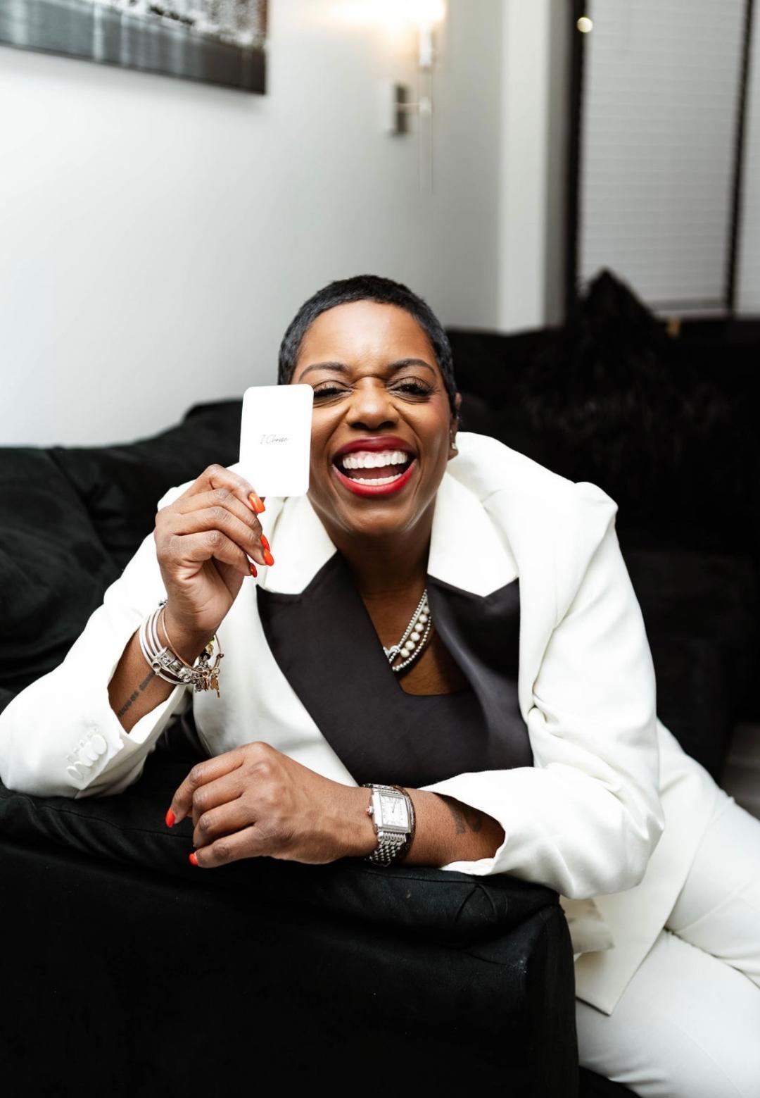 Crystal Purdue holding an I Choose card