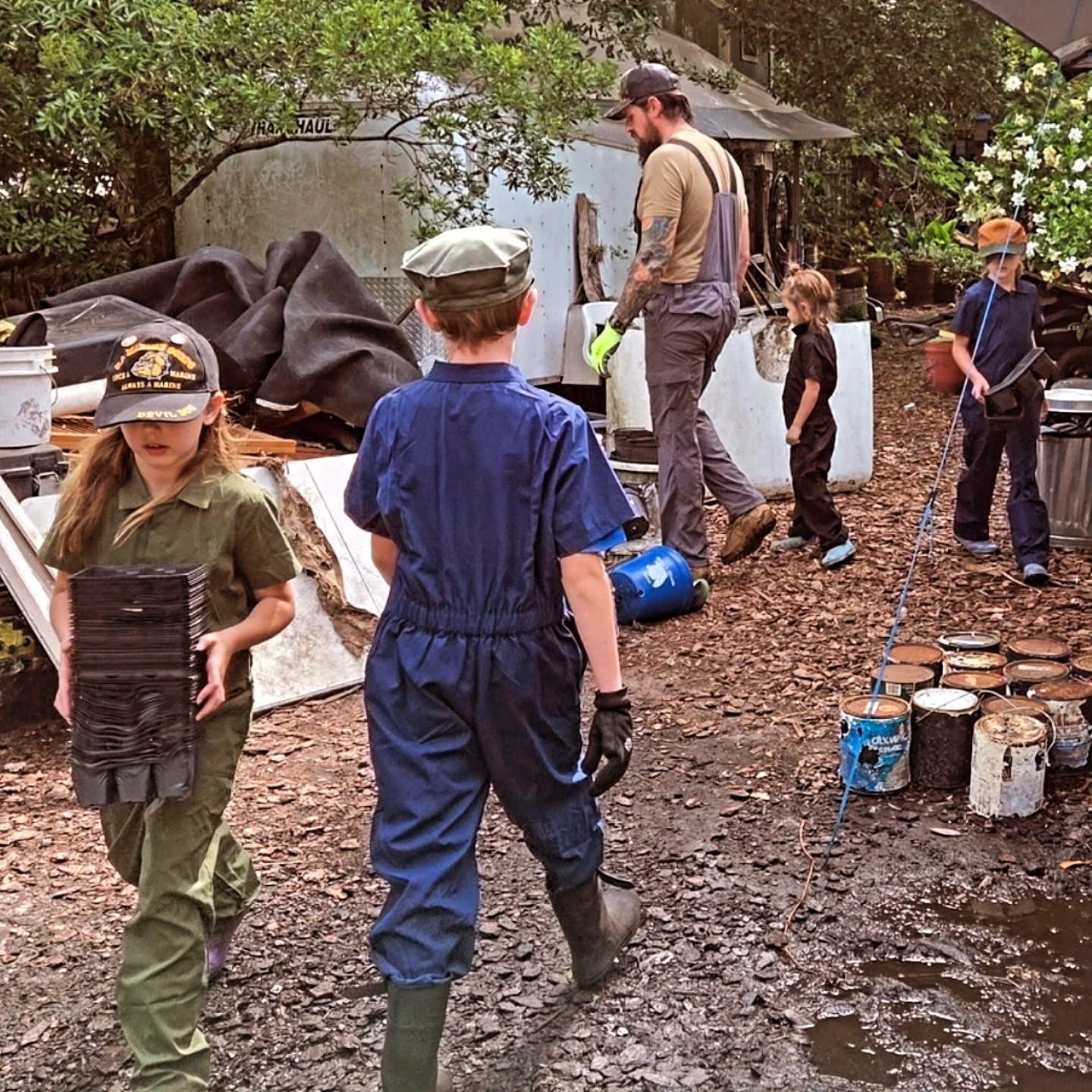 Jesse Chandler and family working a junk removal job in Jacksonville