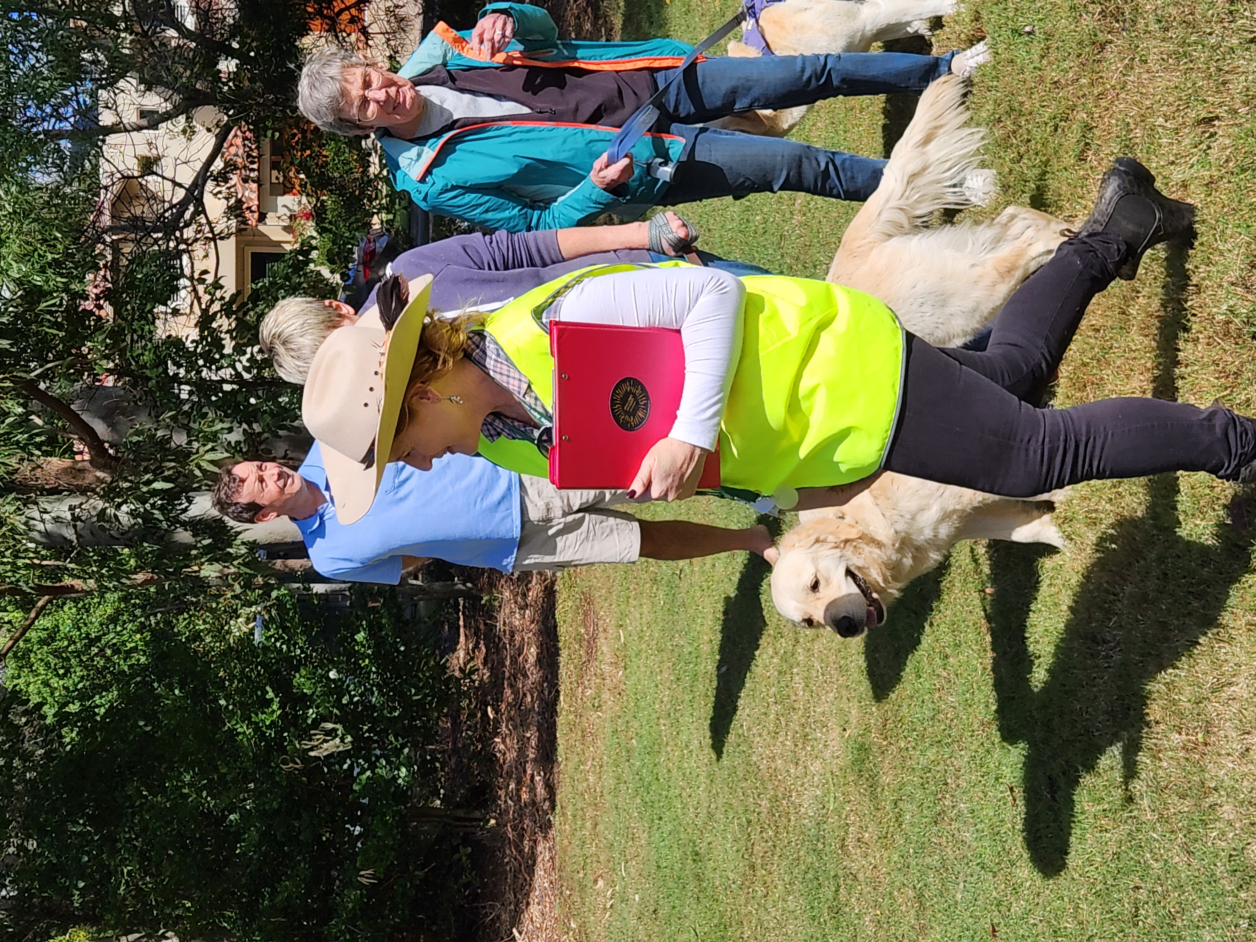 Competition winner celebrating with their golden retriever