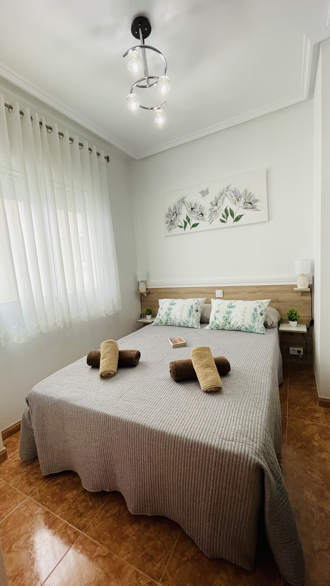 Master bedroom with comfortable bed