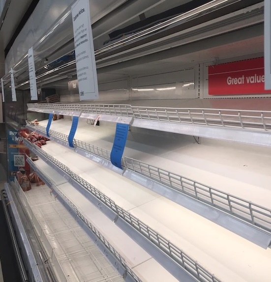 Empty supermarket shelves — the visible end of a fragile supply chain