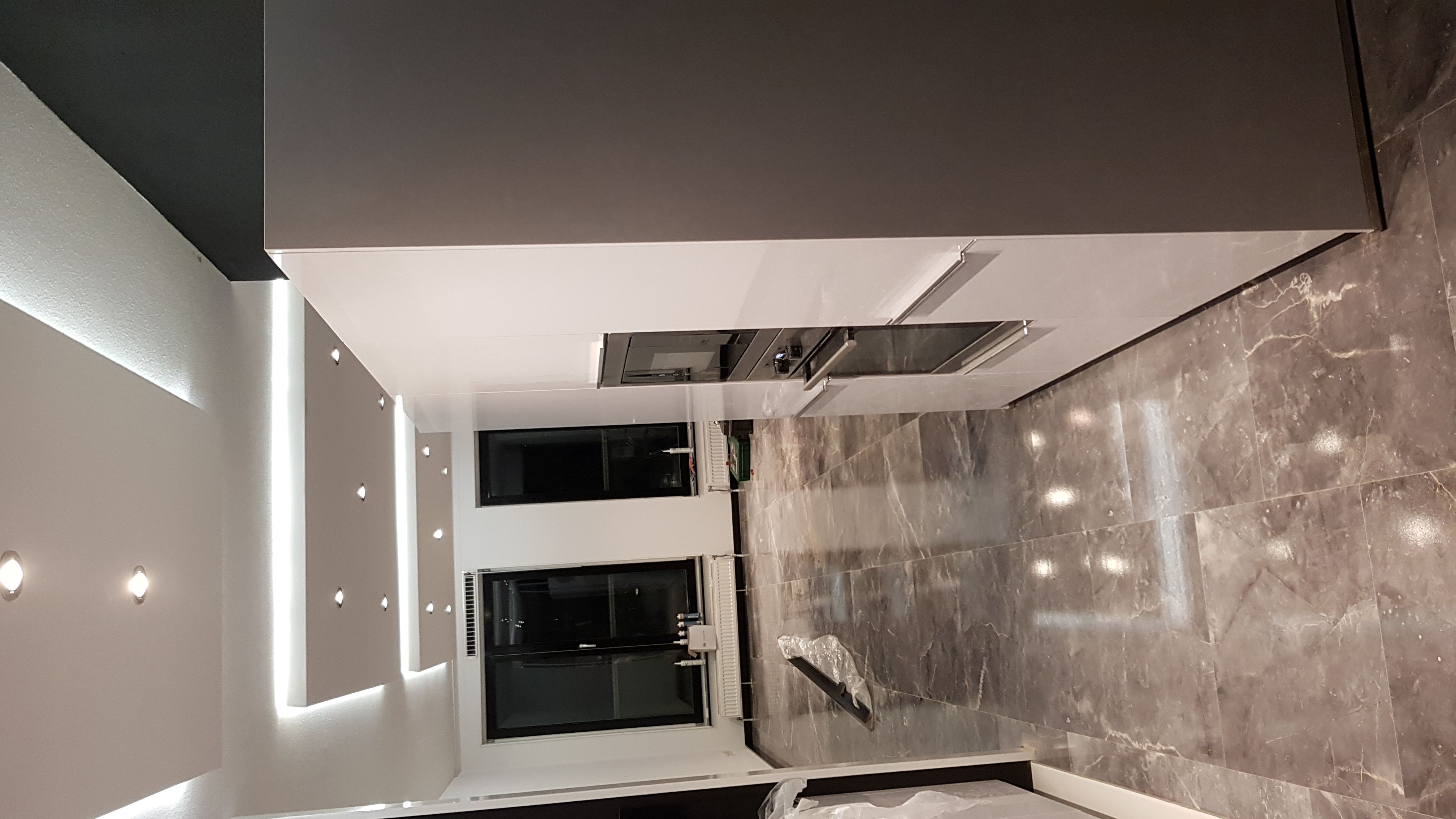 Glossy Floor Tiles & LED Ceiling