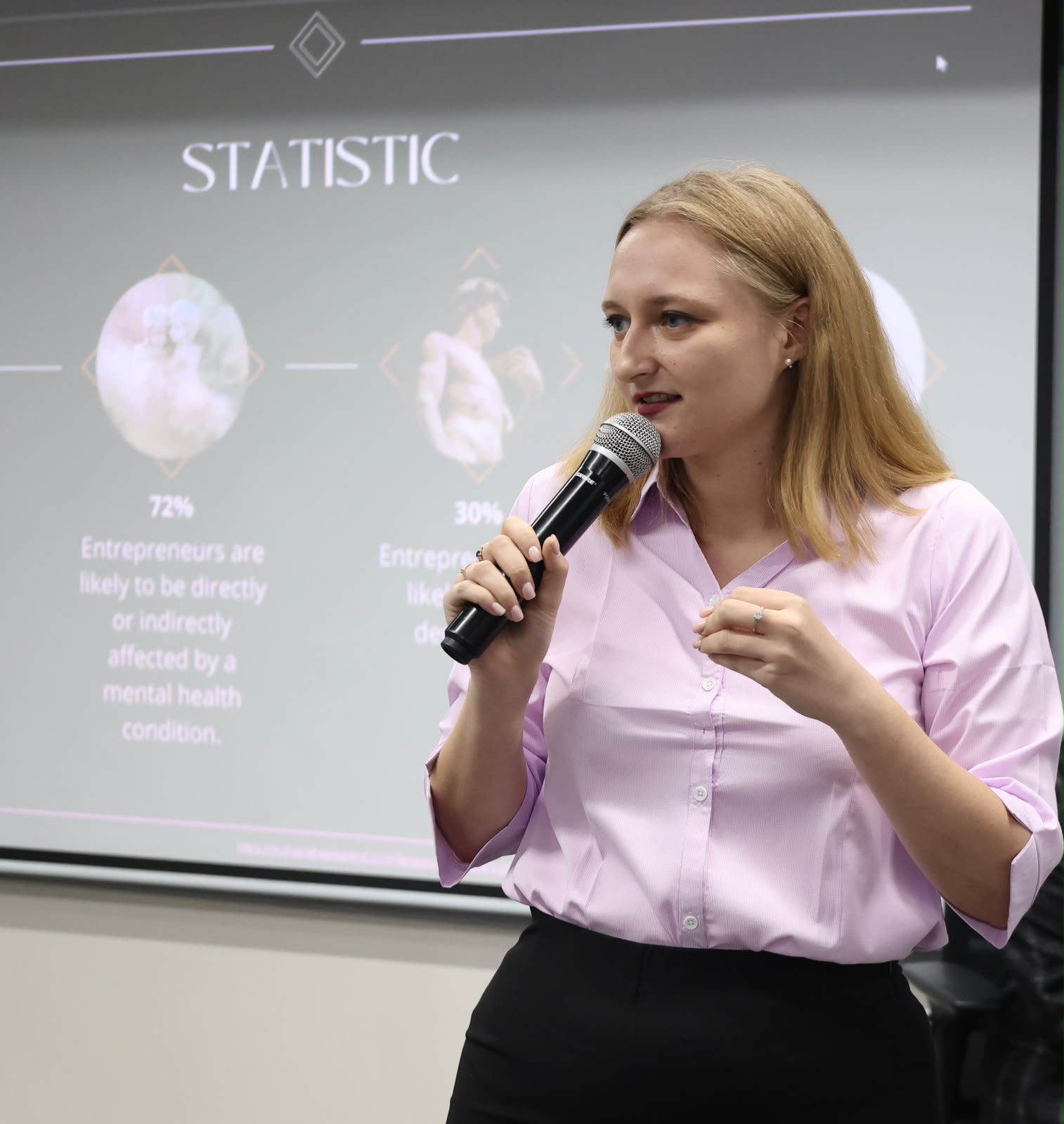 Kate Pandharkame presenting on founder wellbeing