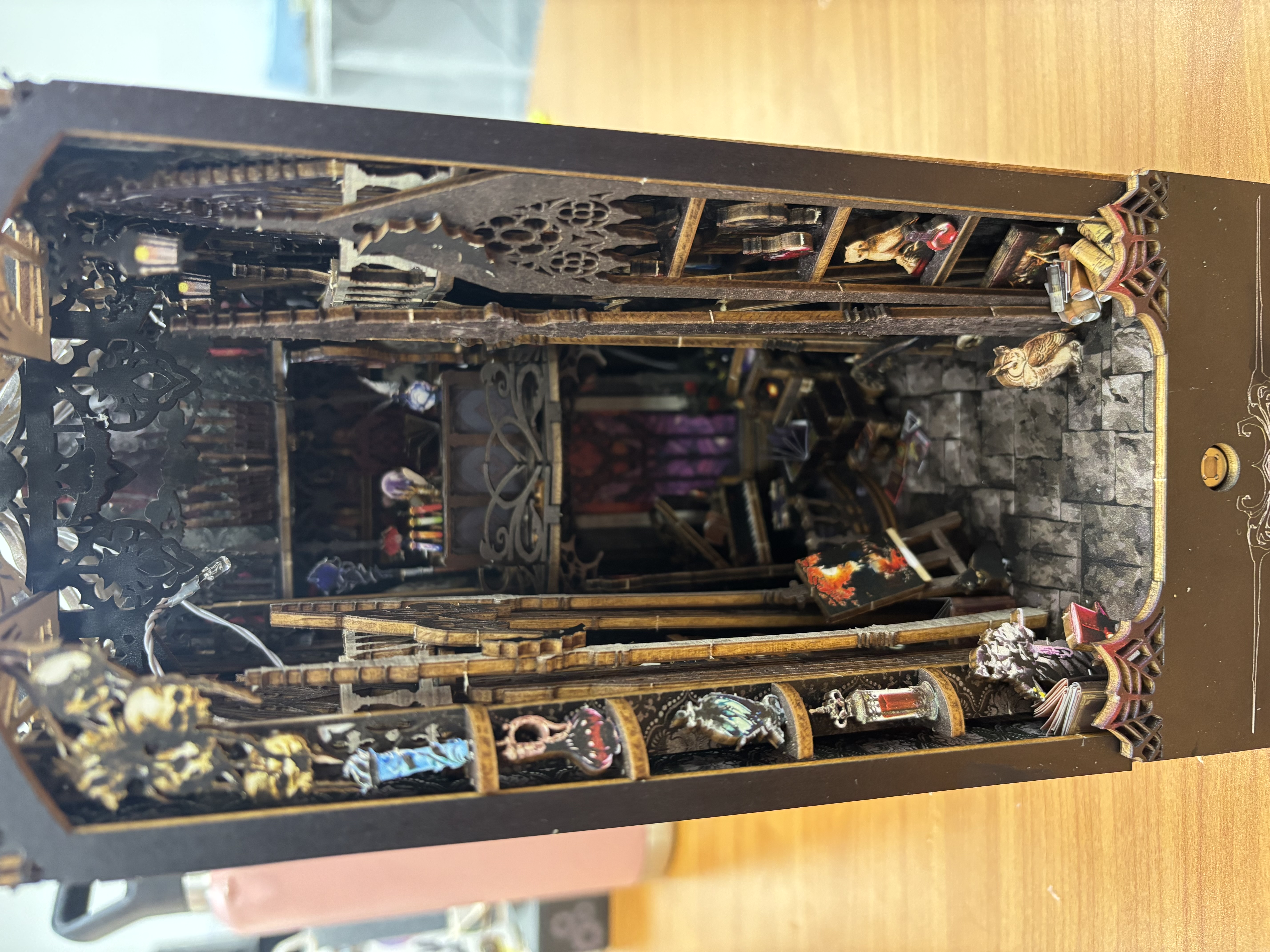 Detailed book nook miniature scene - magical library diorama craft project
