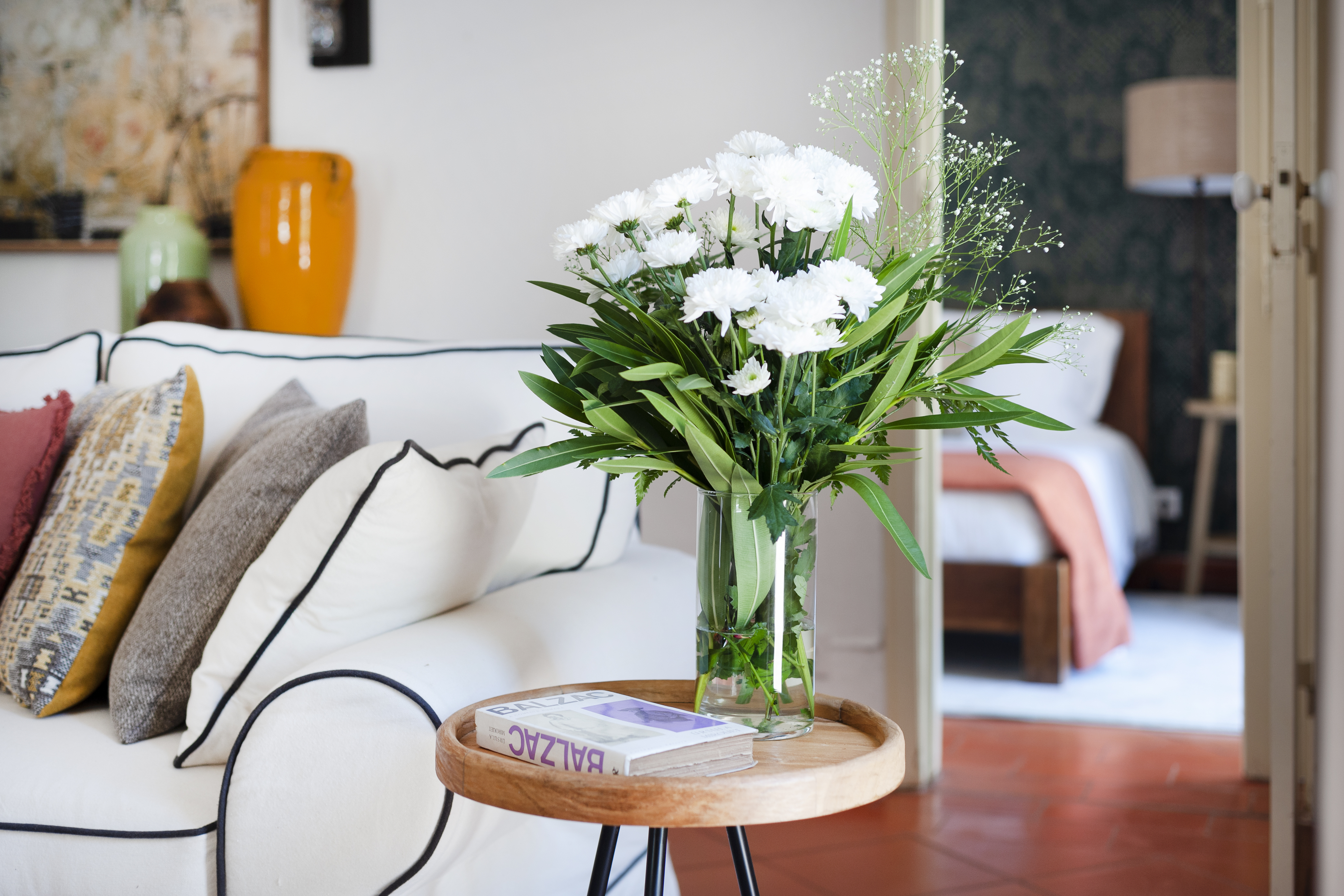 Wood Oven House II living room with flowers