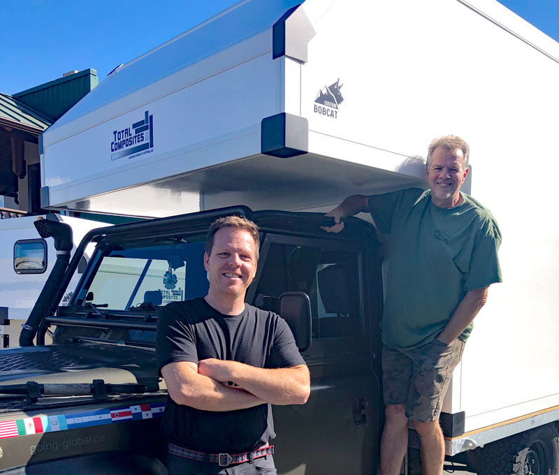 Andreas Schwall in front of a Total Composites Bobcat camper