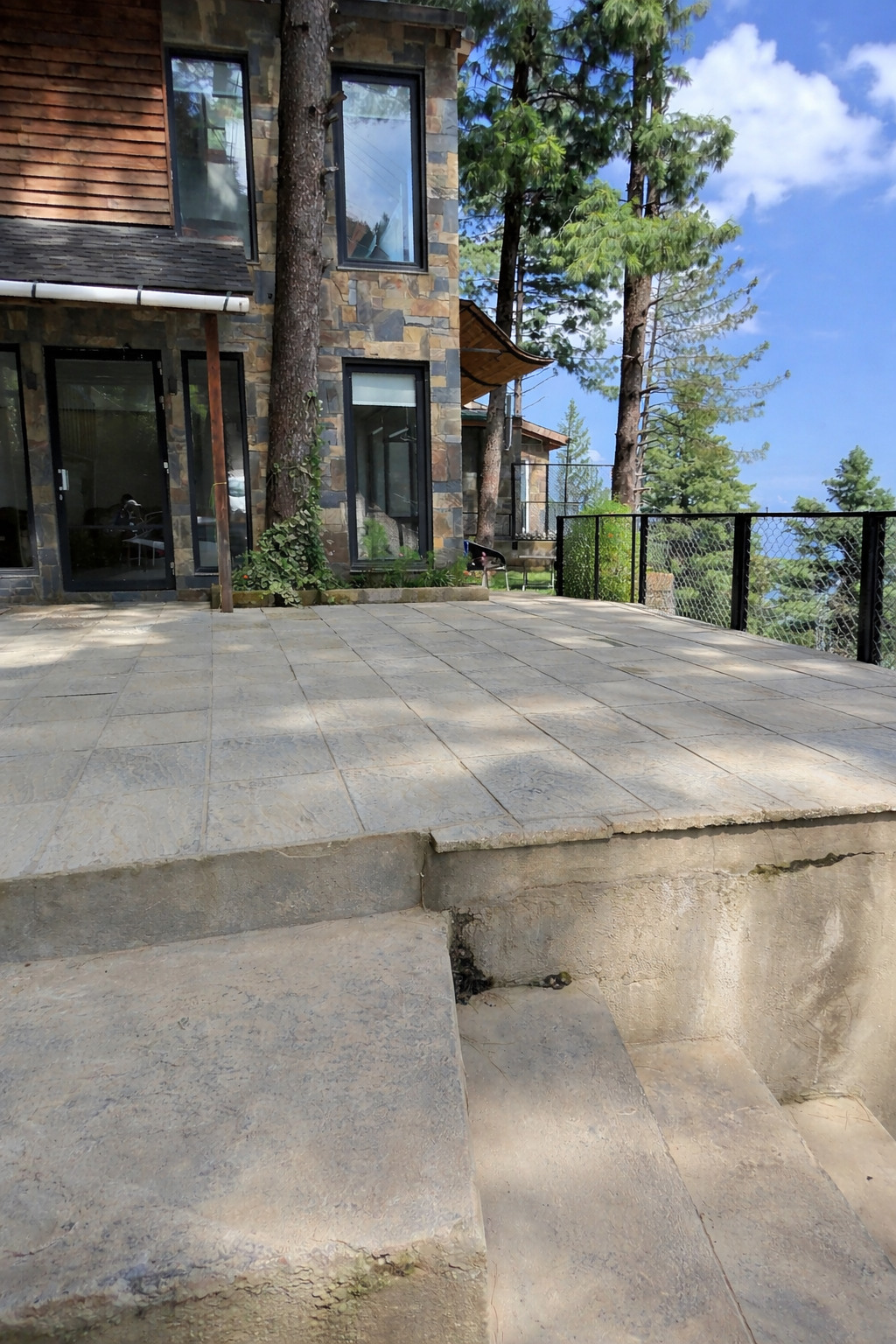 Stone and timber residence at Pine Ridge — mountain architecture