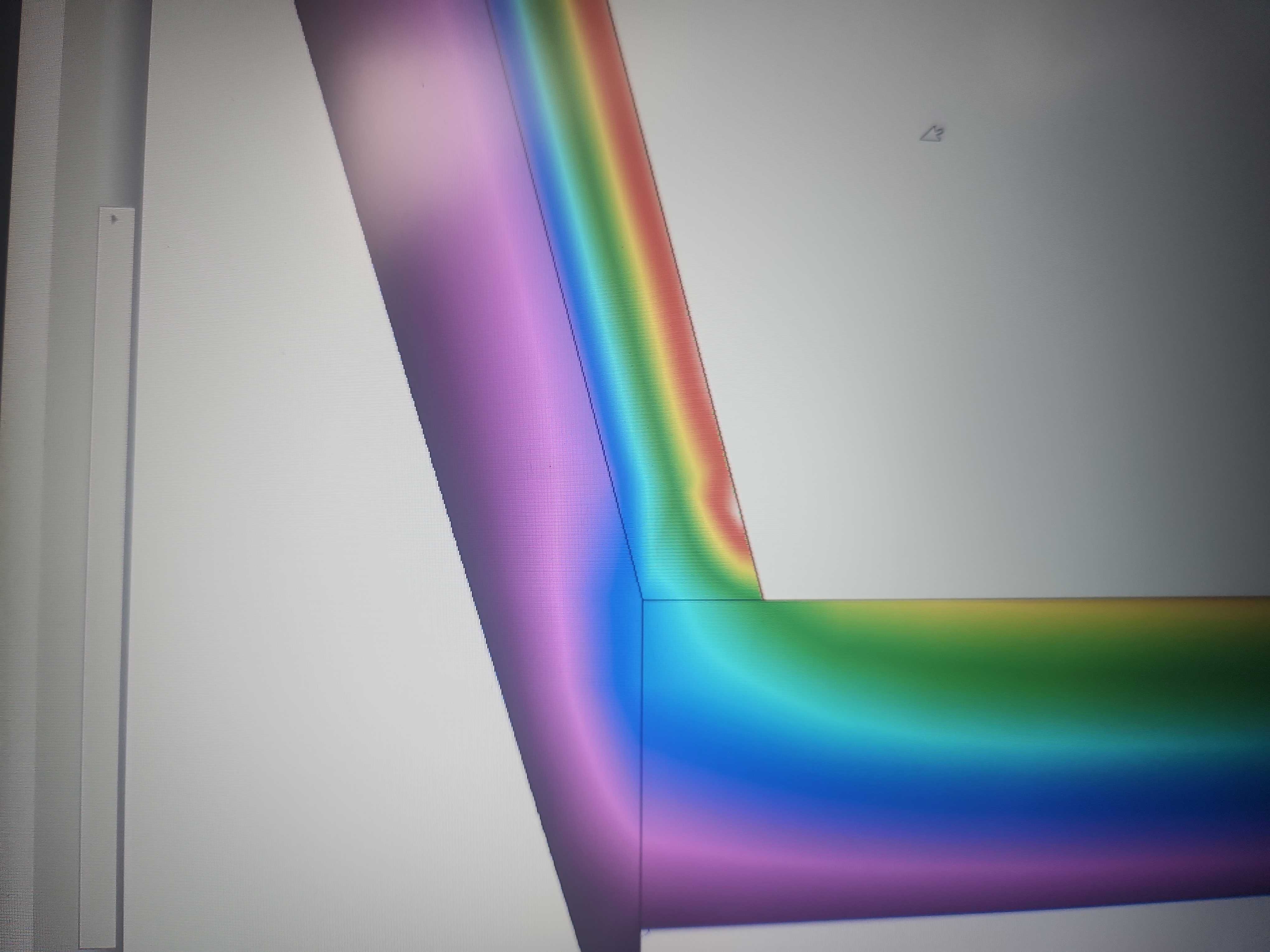 Reference simulation showing insulation installed at ceiling level only. The model highlights a stronger thermal bridge at the ceiling-to-wall junction, resulting in lower internal surface temperatures and a higher condensation risk compared with the improved design.