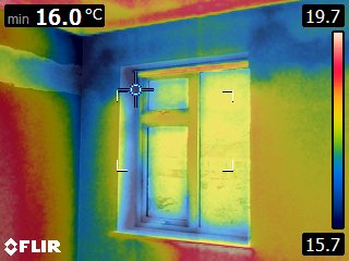 Whole-window thermal survey identifying lower surface temperatures around the frame and reveals compared with adjacent wall surfaces. The thermal pattern is consistent with elevated heat loss around the window opening.
