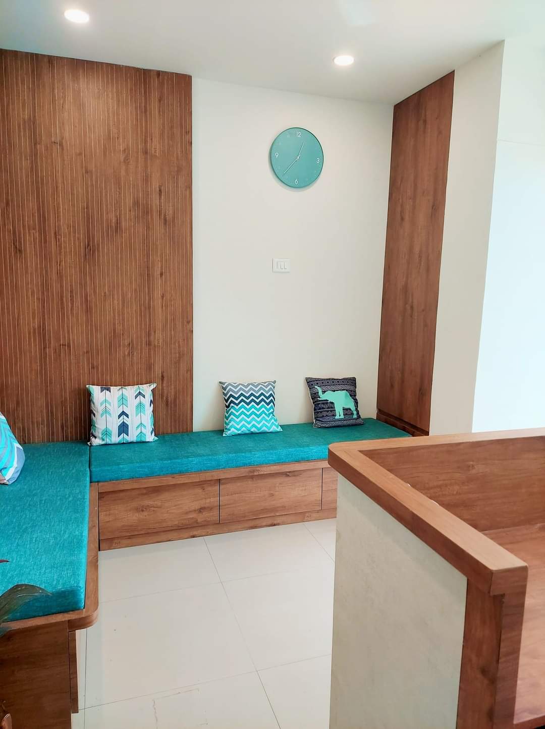 Wooden waiting lounge with clock