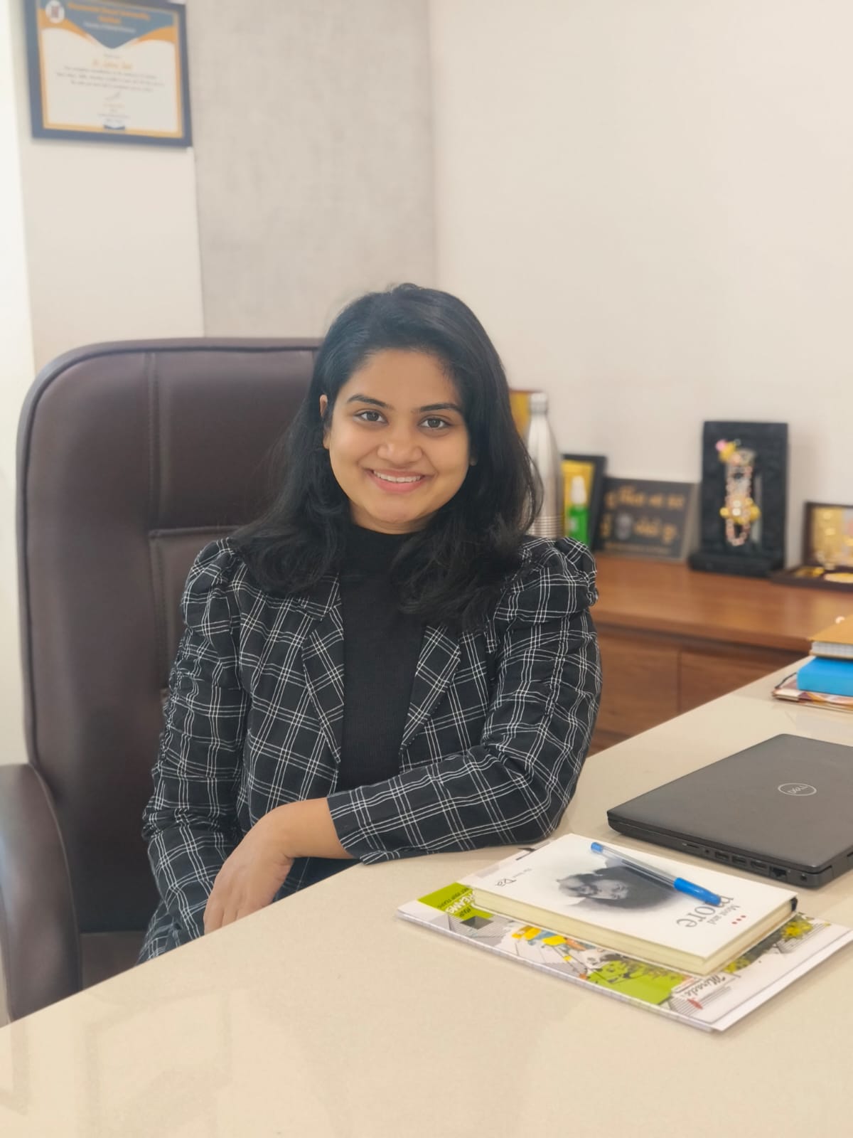 Dr. Saloni Shah at consultation desk