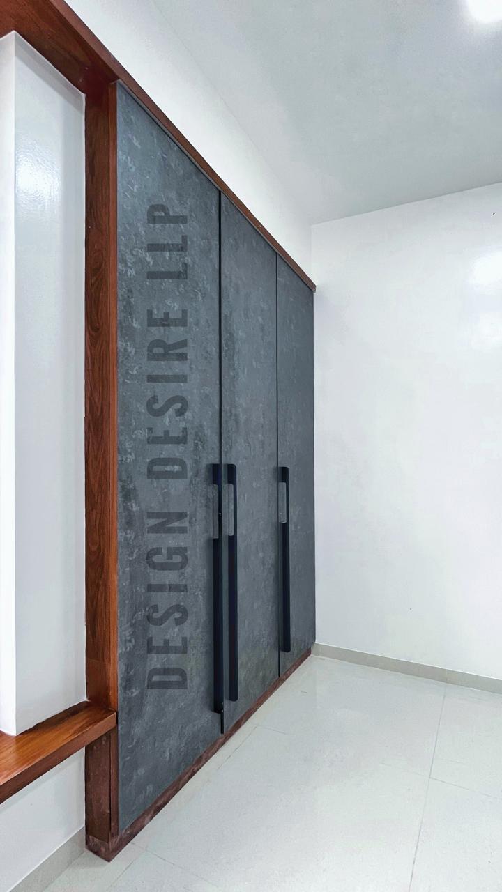Main door — deep-blue gloss with heritage brass handle