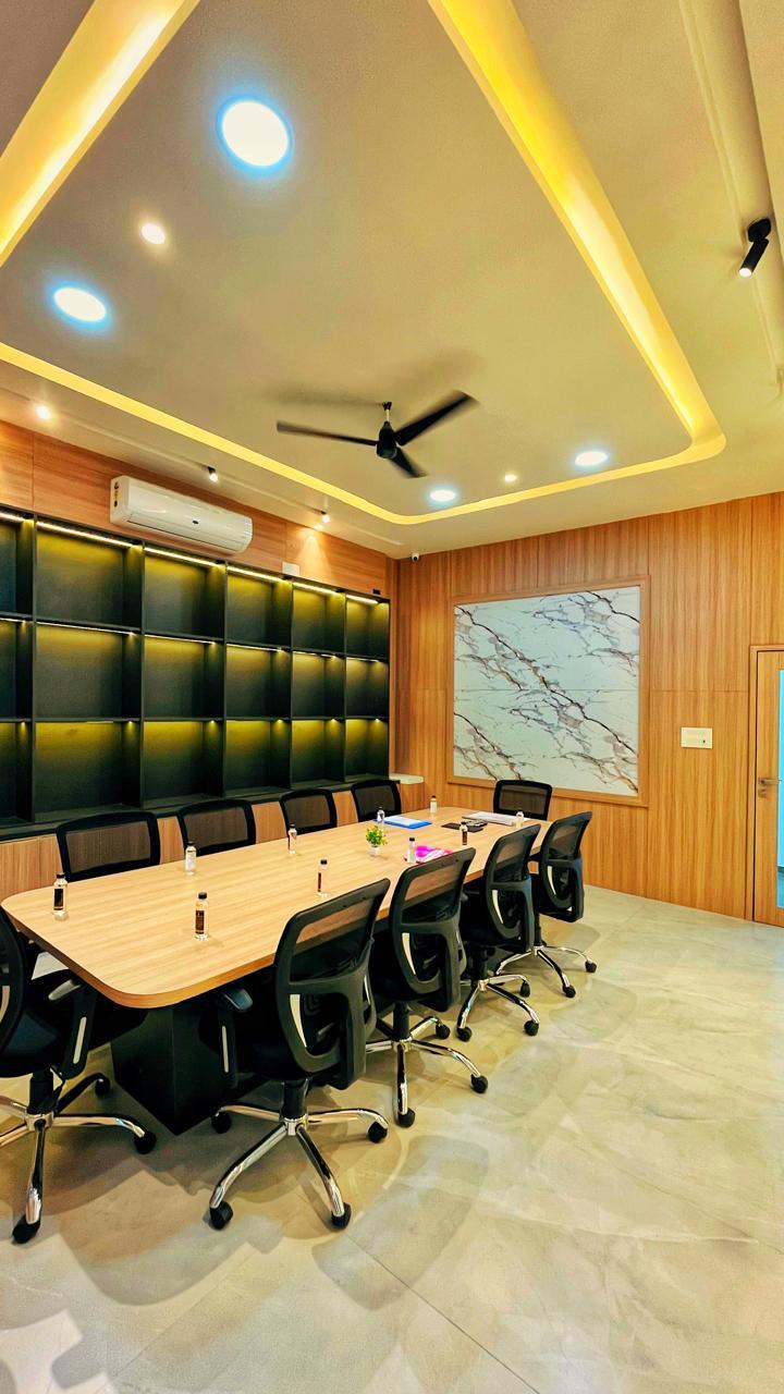 Boardroom — lit leather-tile wall & long walnut table