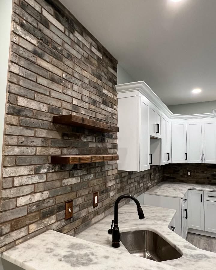 White Cabinetry & Exposed Brick