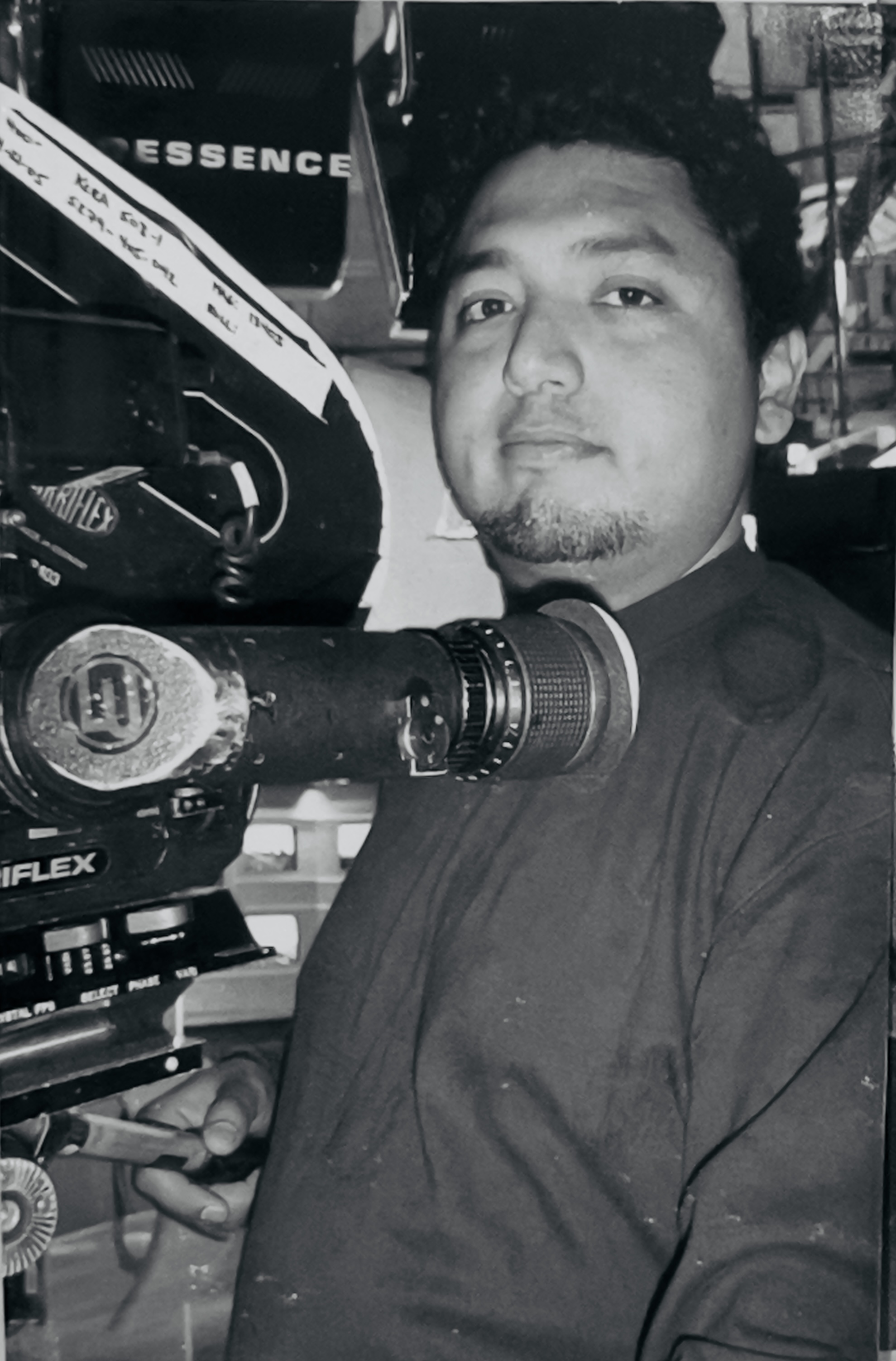 John Alexander Jimenez behind a 35mm Arriflex camera — early career, undated.
