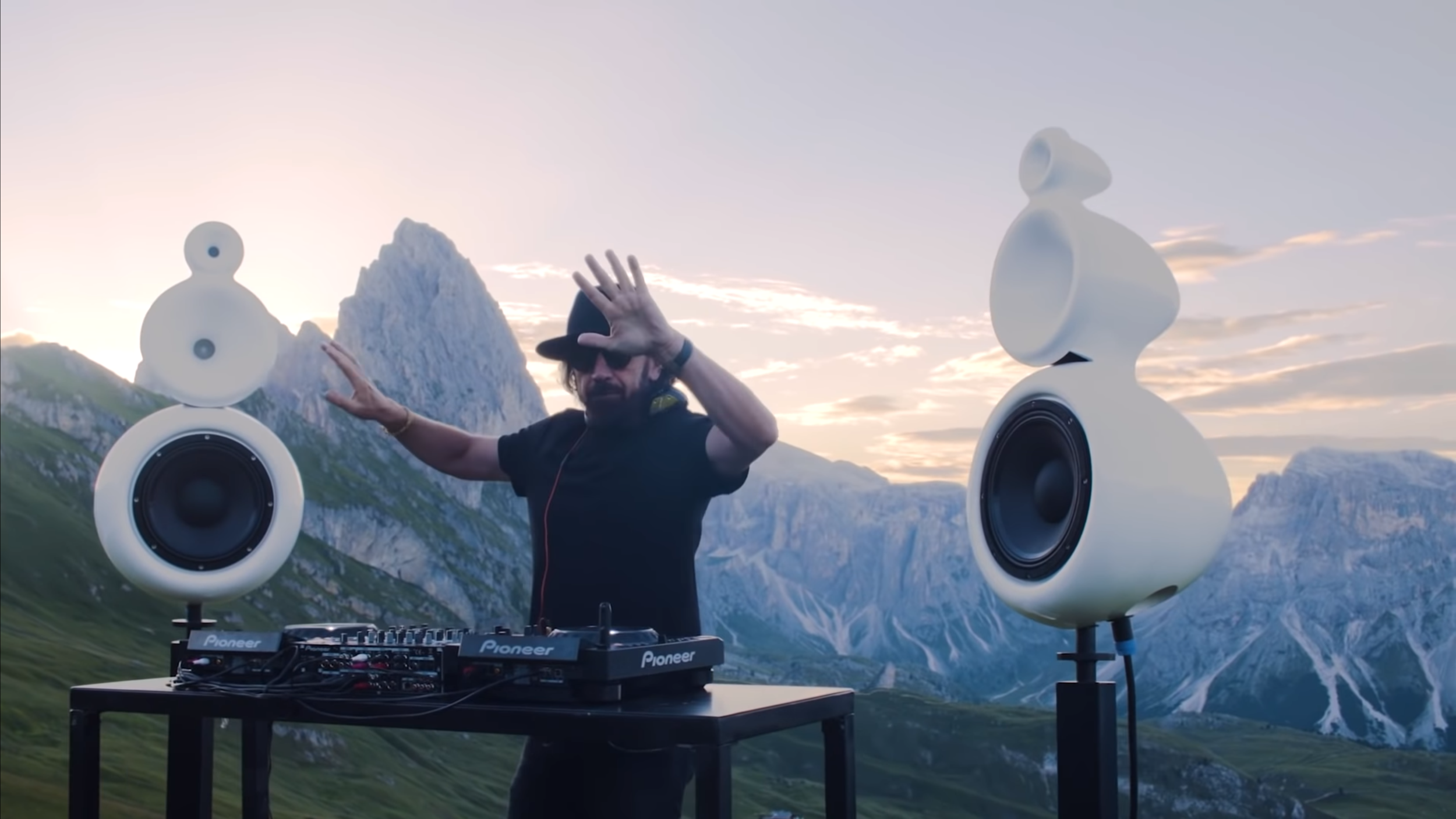 DJ setup with mountains backdrop