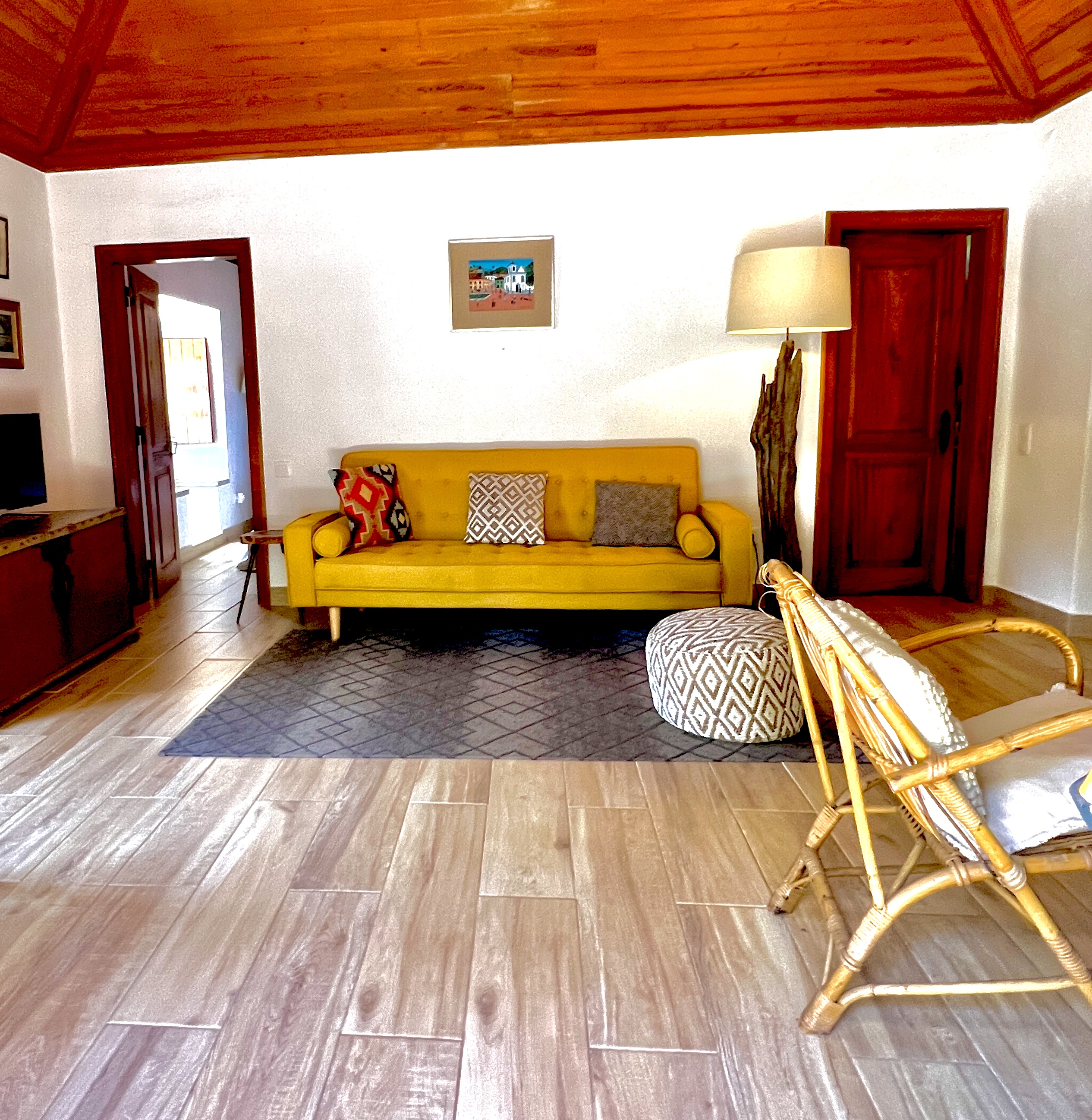 Pine Tree House living room with yellow sofa
