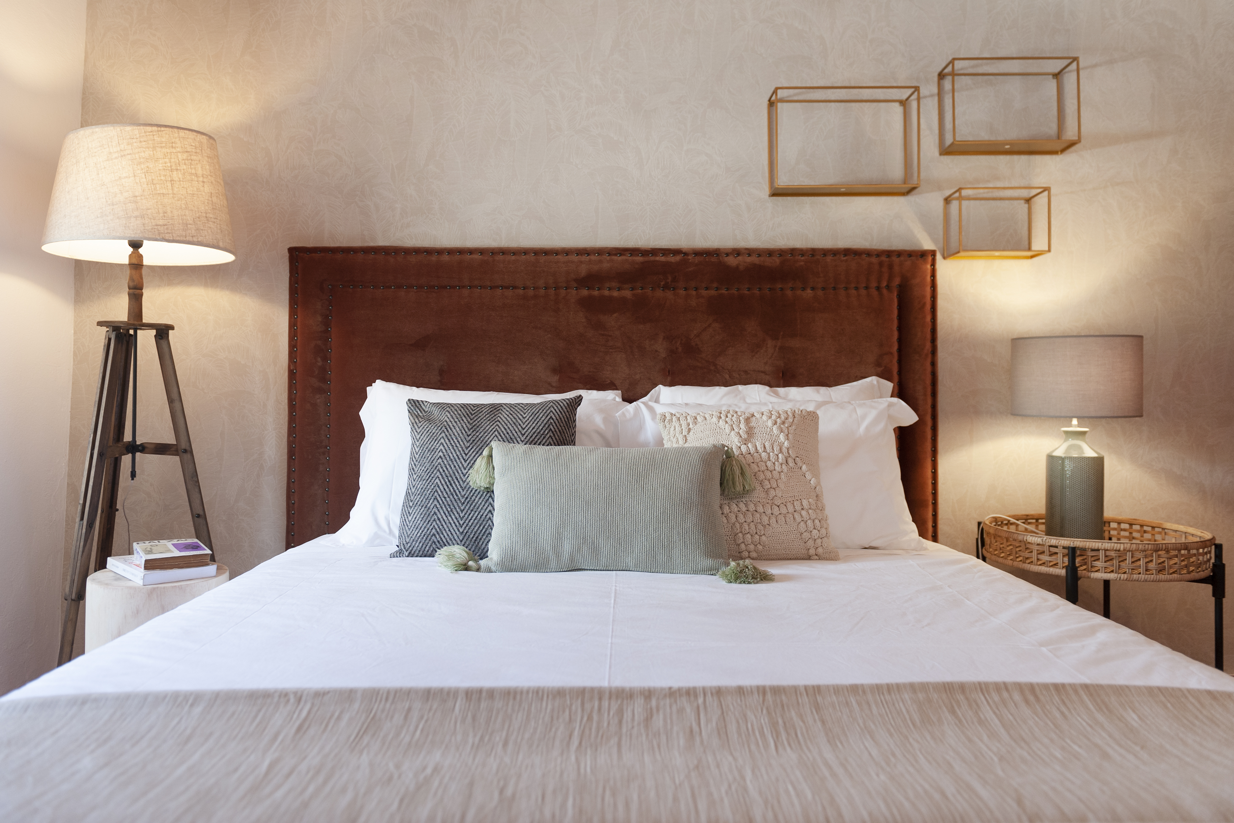 Pine Tree House bedroom with velvet headboard