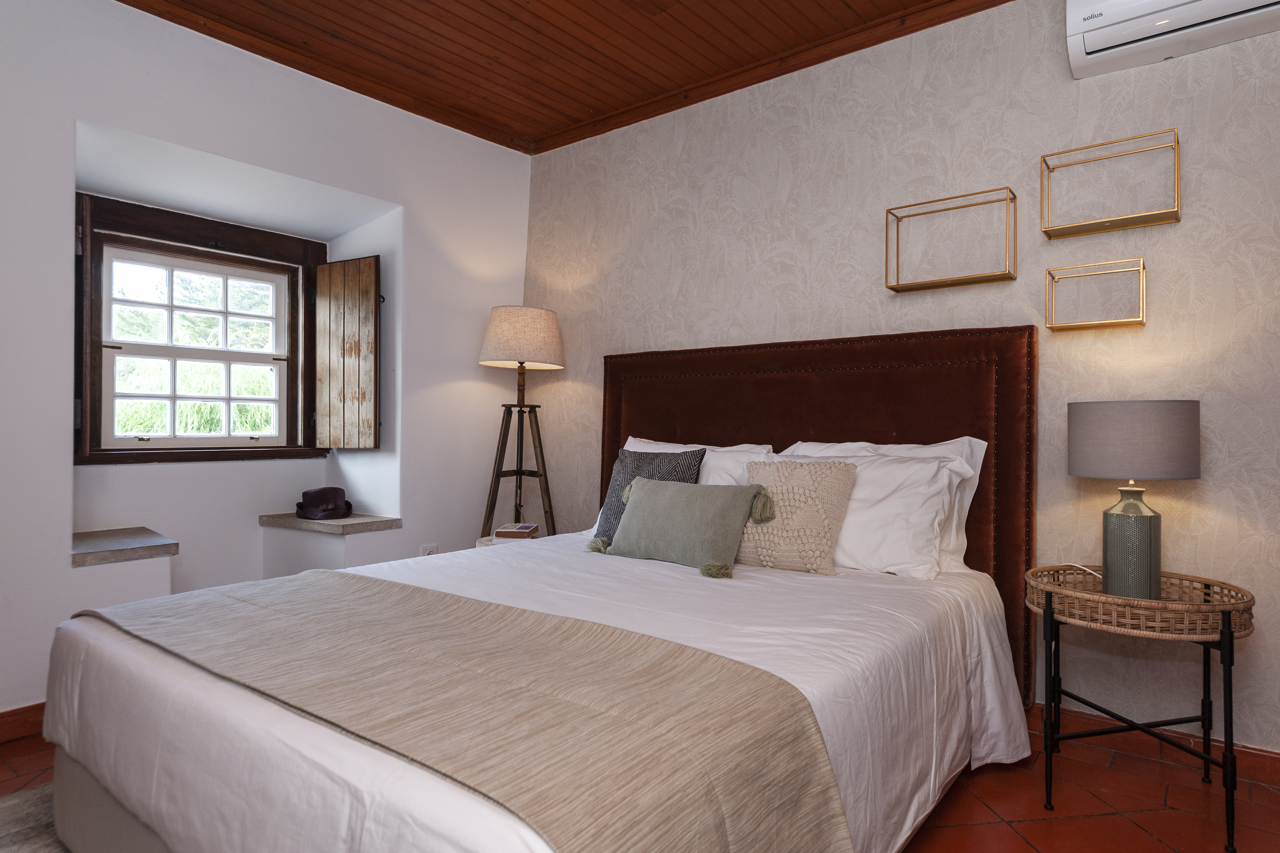 Pine Tree House bedroom with wooden ceiling