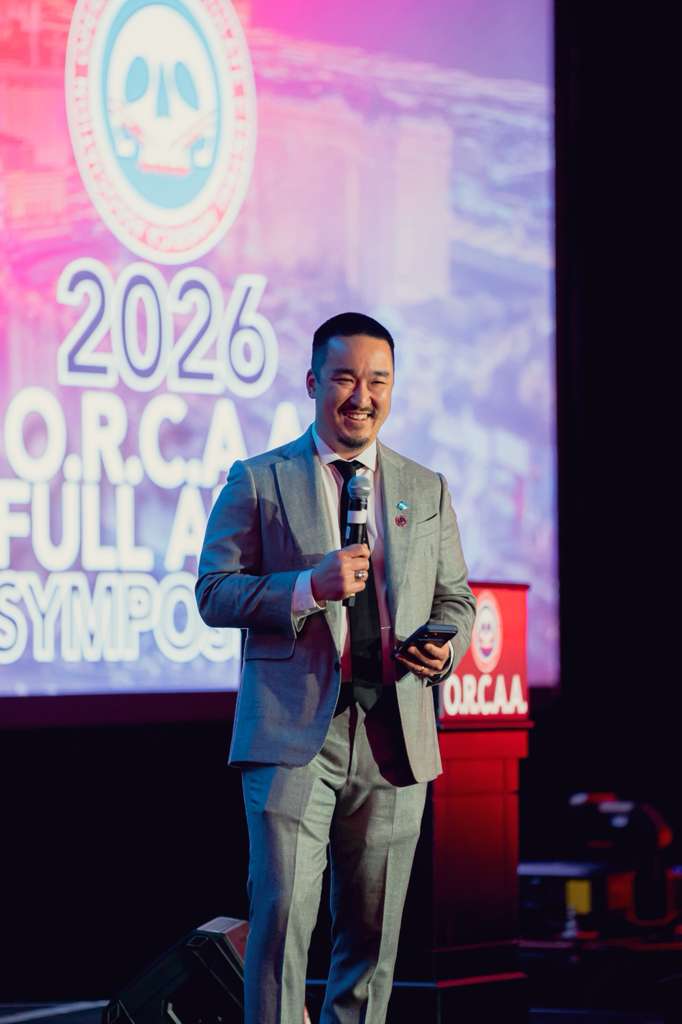 Dr. Simon Oh speaking at the 2026 ORCAA Full Arch Symposium