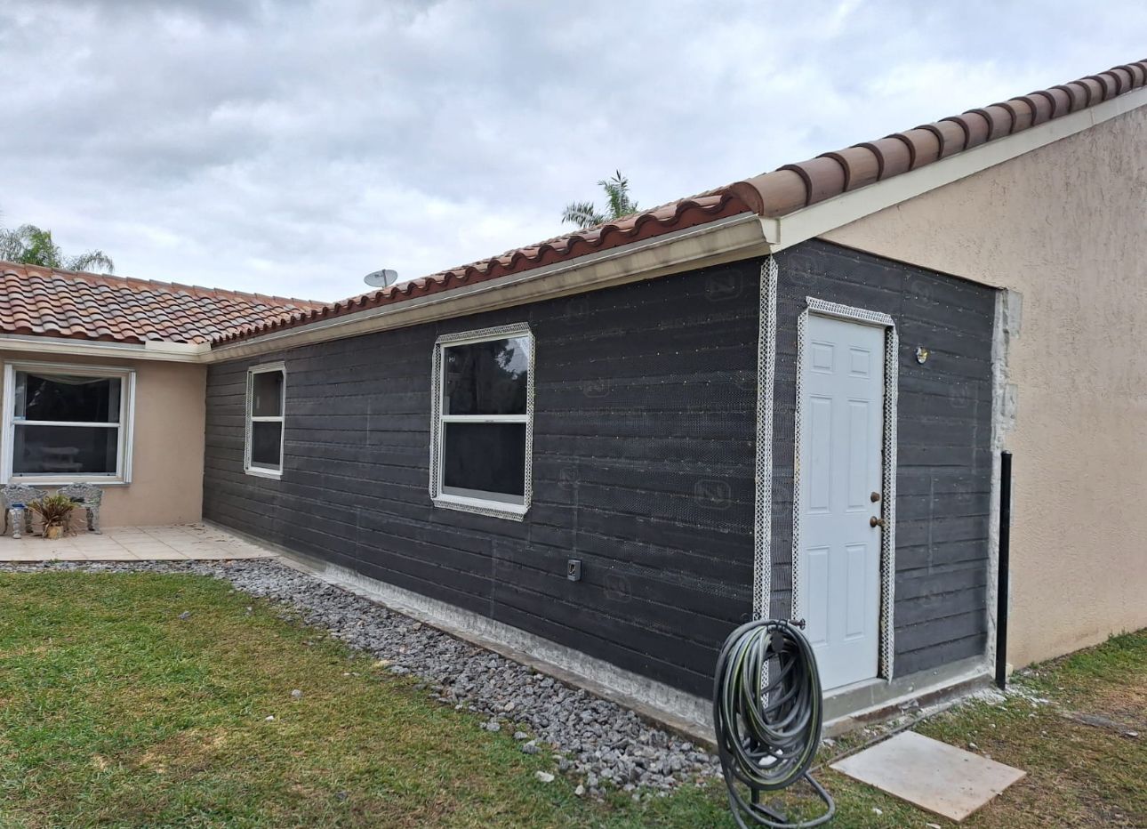 Home addition with new roof construction in Naples Florida - JY Mega FC licensed contractor