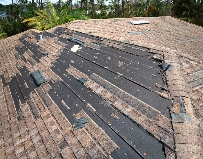 Home with storm-damaged roof