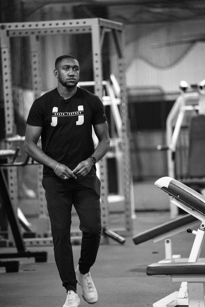 Coach JJ leading a training session