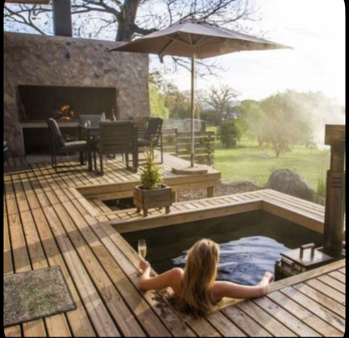 Private wellness with wooden deck and view