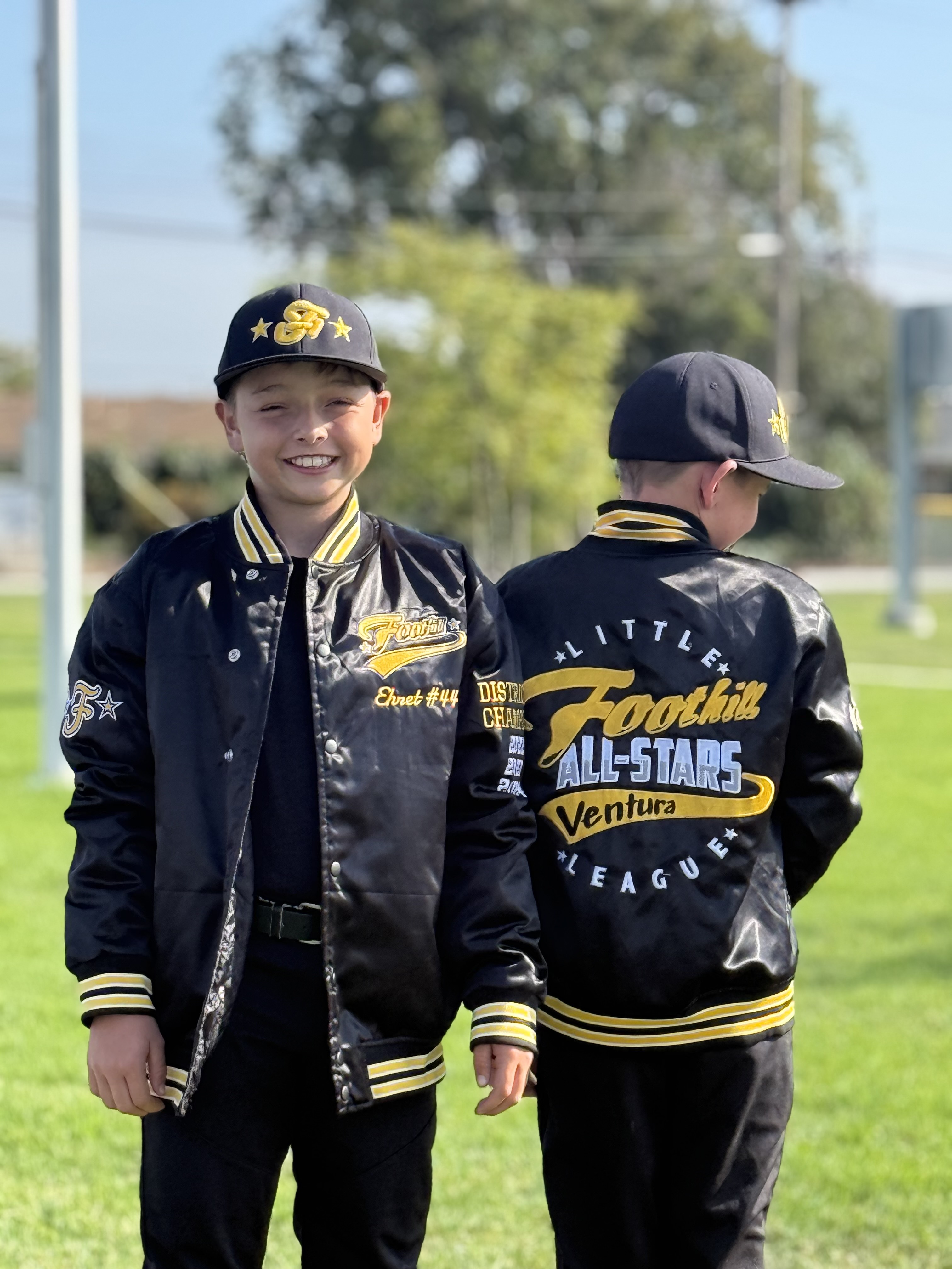 Foothill All-Stars player wearing their jacket