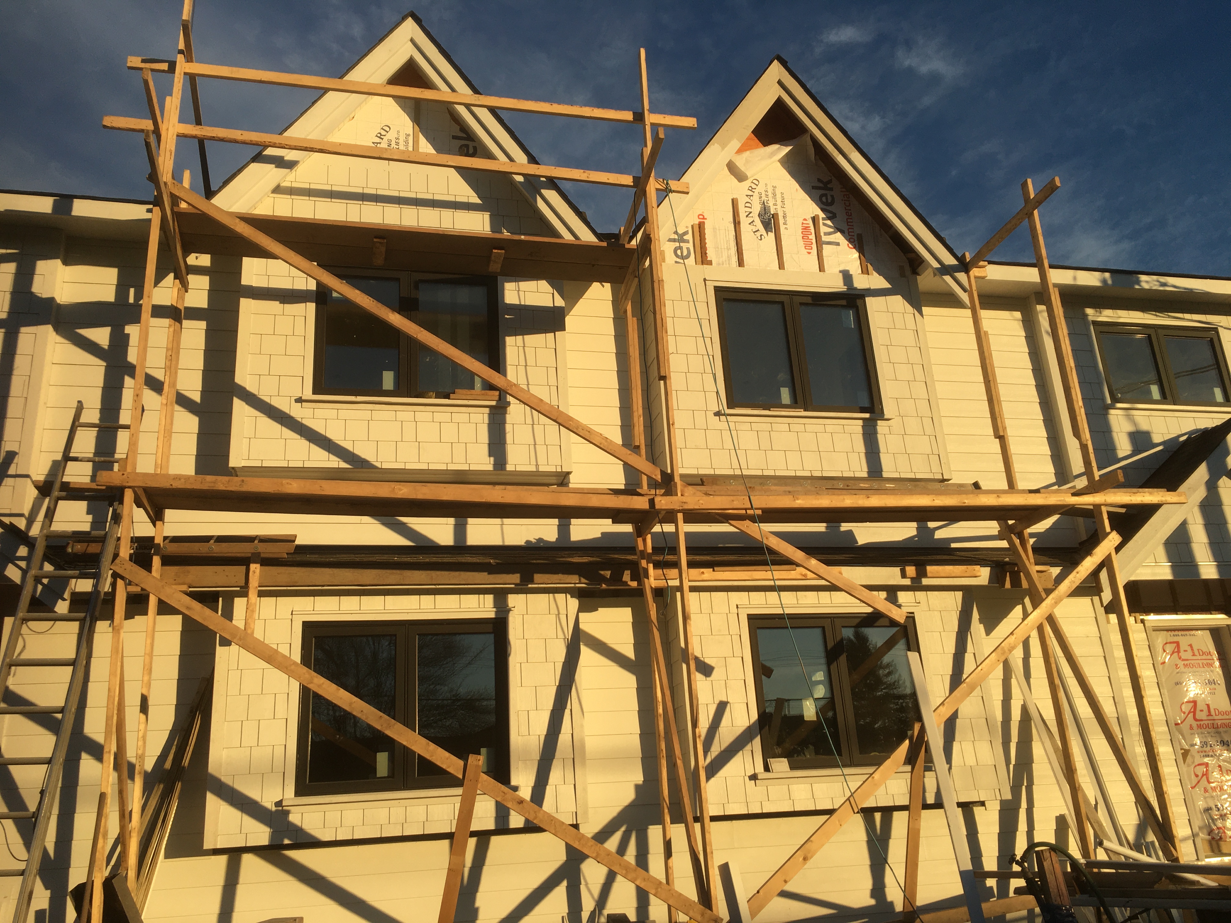 Large home exterior painting - White shingle siding