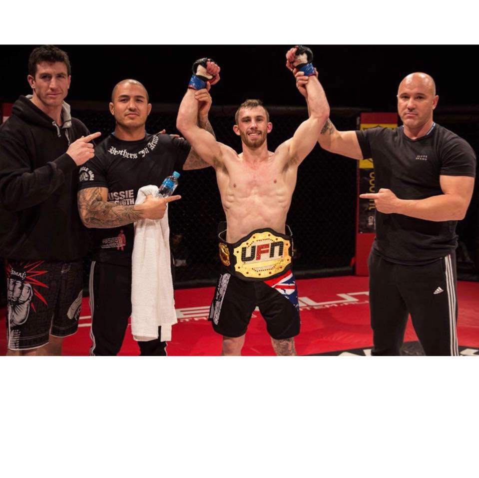 Russell Thompson cornering his fighter to a UFN championship victory