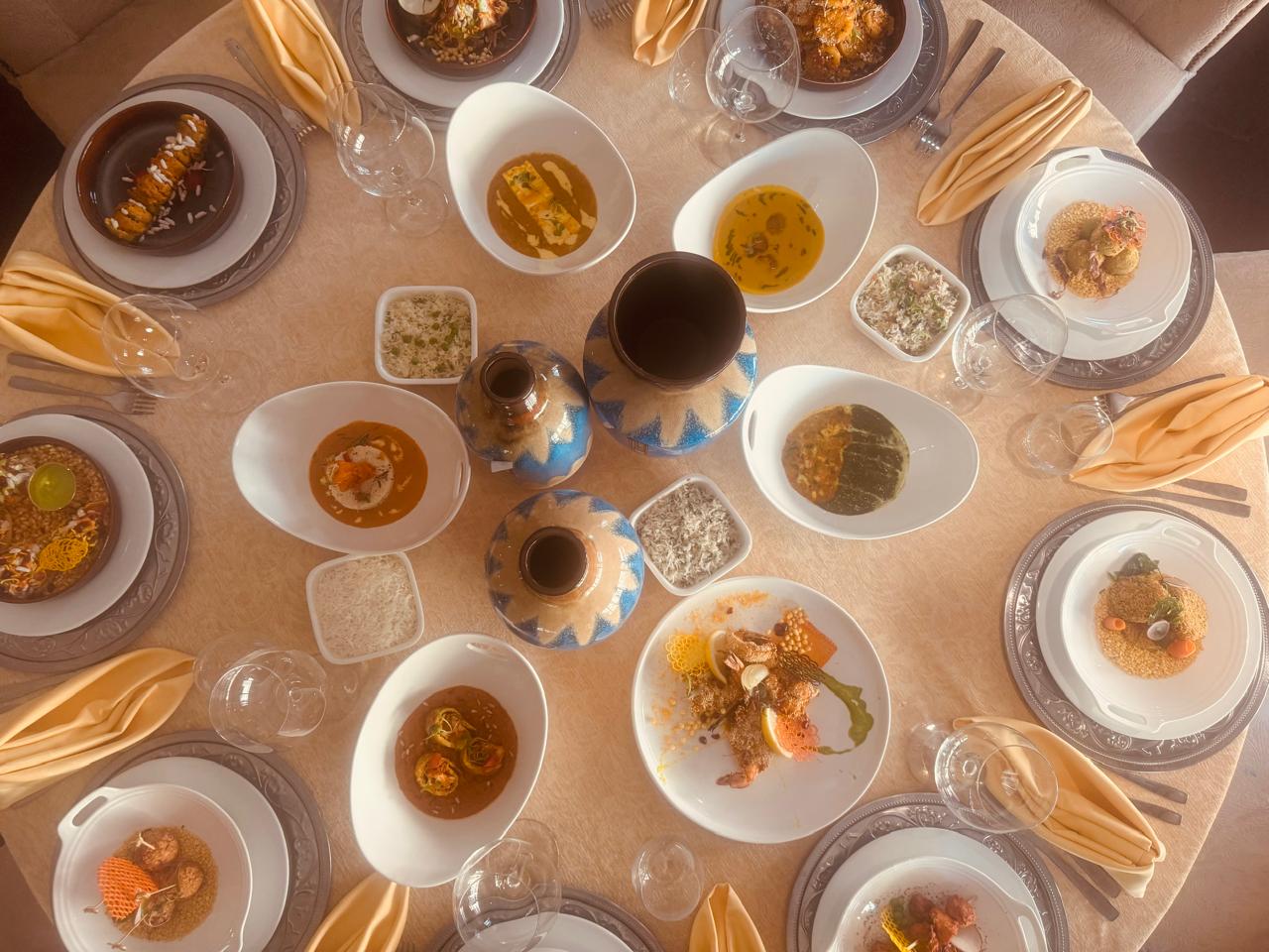 Top-down table spread with floral centerpieces