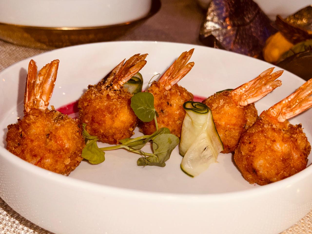Crispy fried prawns with beetroot sauce