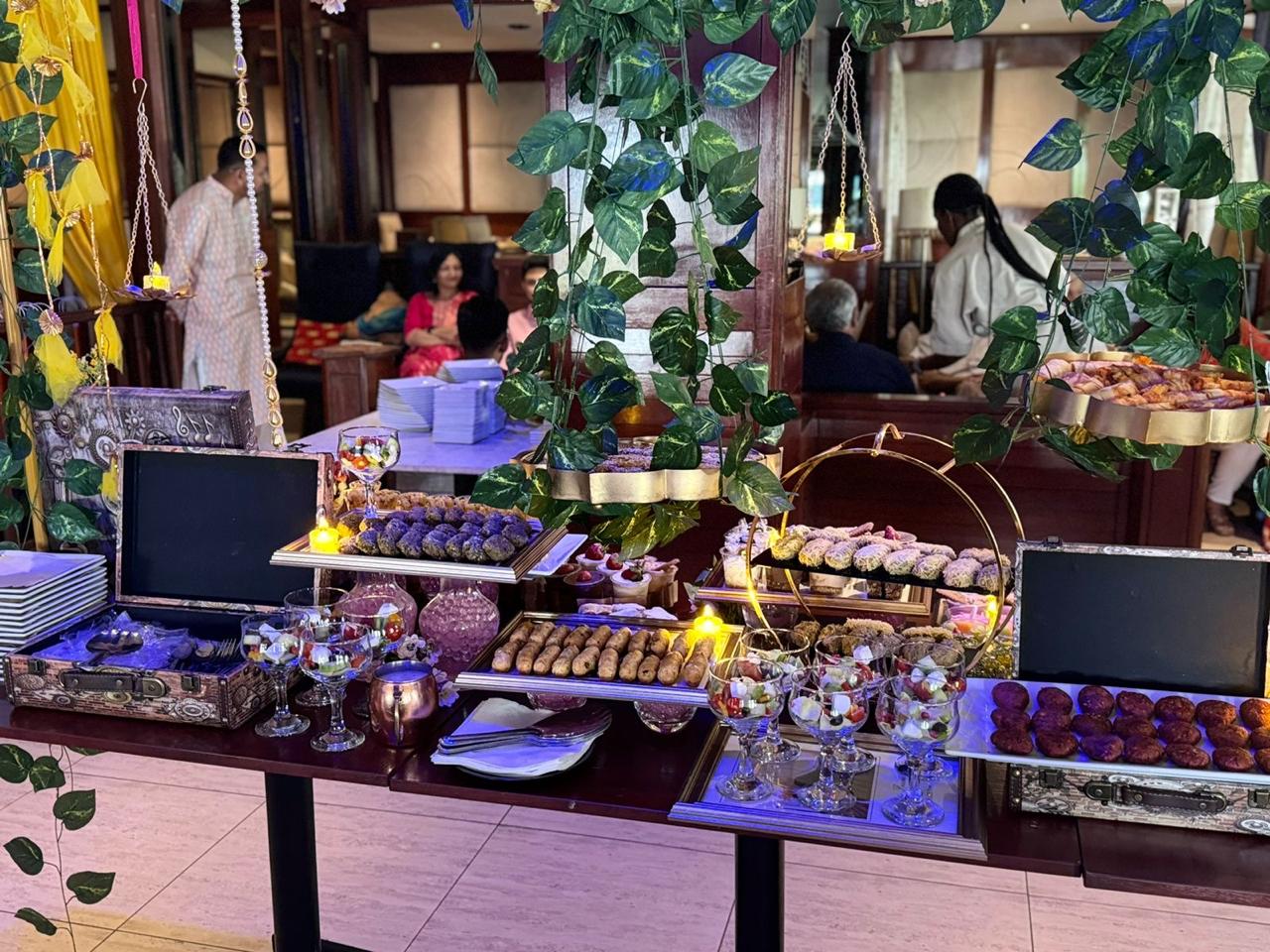 Full catering spread with guests