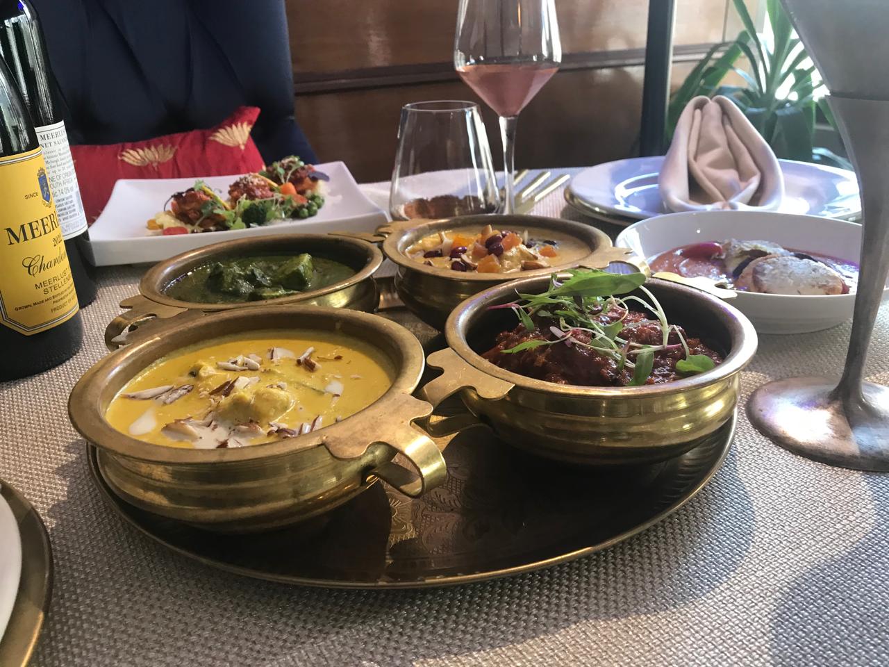 Curry quartet in brass pots