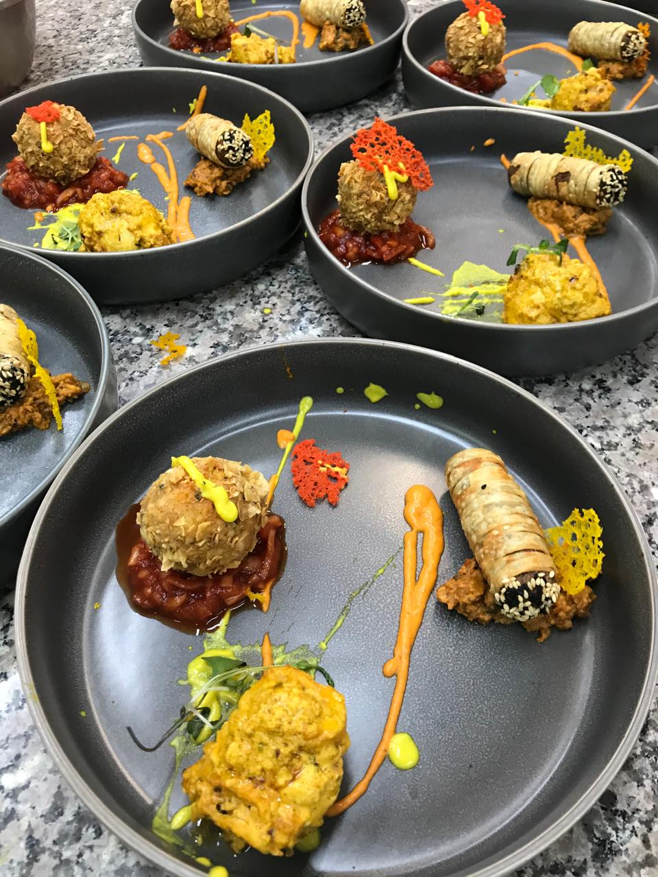 Artisan kebab trio with sauce art